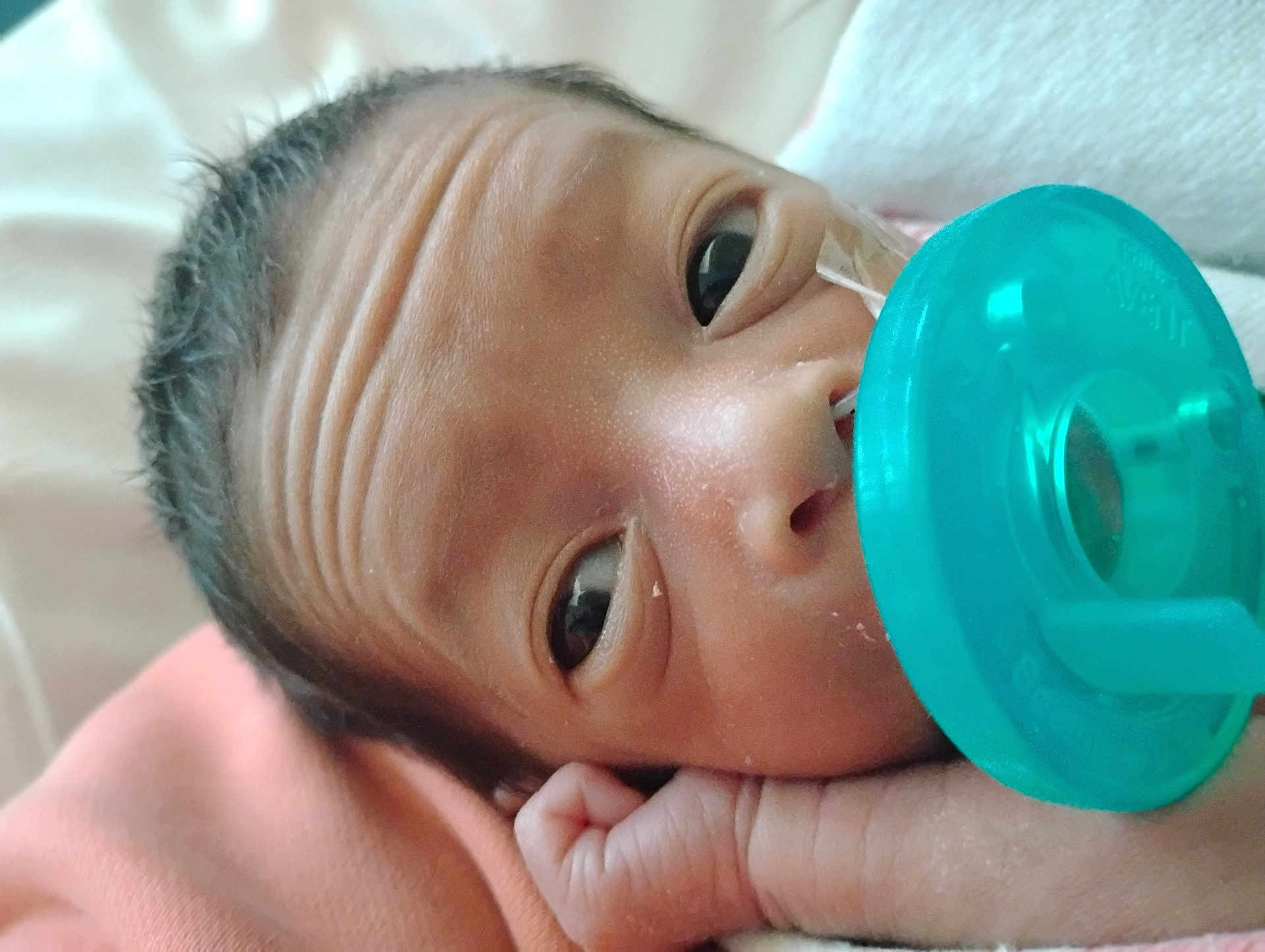 Amari joined the competition — help win amazing prizes! baby, newborn, pacifier, face, hand, skin, infant, closeup, sleeping, blanket, cute, child, small, resting, portrait, human, newborn_baby, soft, indoors, peaceful