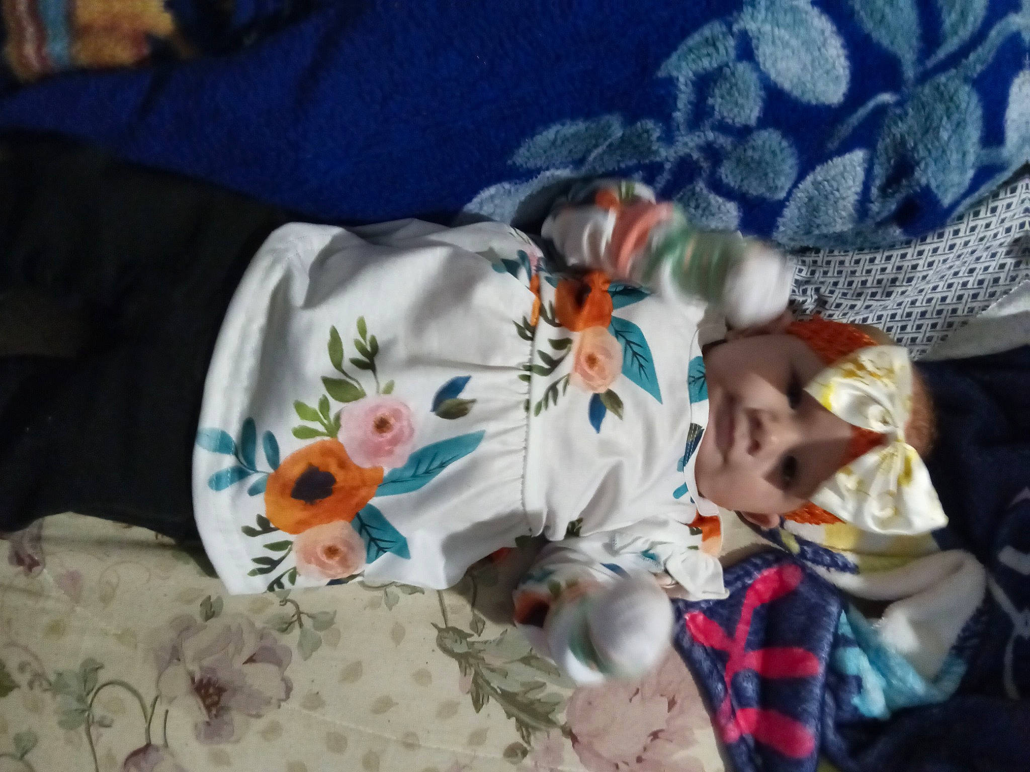 Layla is registered to the contest to win money with this photo: baby, baby_products, baby_toddler_clothing, baby_toys, carmine, child, comfort, fur, headwear, linens, pattern, person, room, sleeve, textile, toddler, toy, white