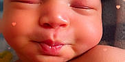 Amina is registered to the contest to win money with this photo: baby, infant, face, skin, cheeks, closed_eyes, puckered_lips, heart_overlay, cute, newborn, portrait, head, shoulder, soft_light, expression, sleeping, adorable, closeup, child, love