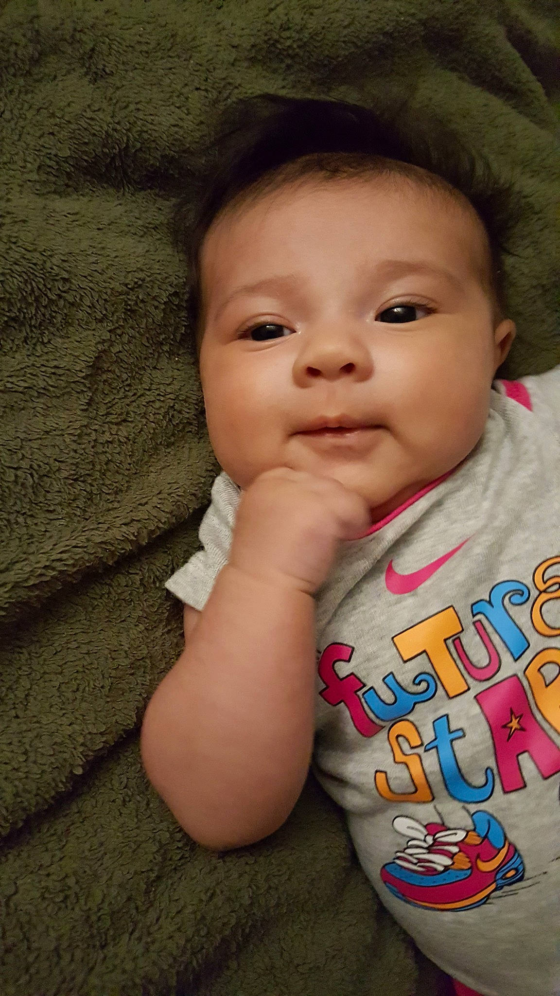 Eliyana is registered to the contest to win money with this photo: boy, cheek, child, eye, face, finger, forehead, girl, hand, happiness, head, infant, iris, mouth, nose, person, sitting, skin, smile, toddler