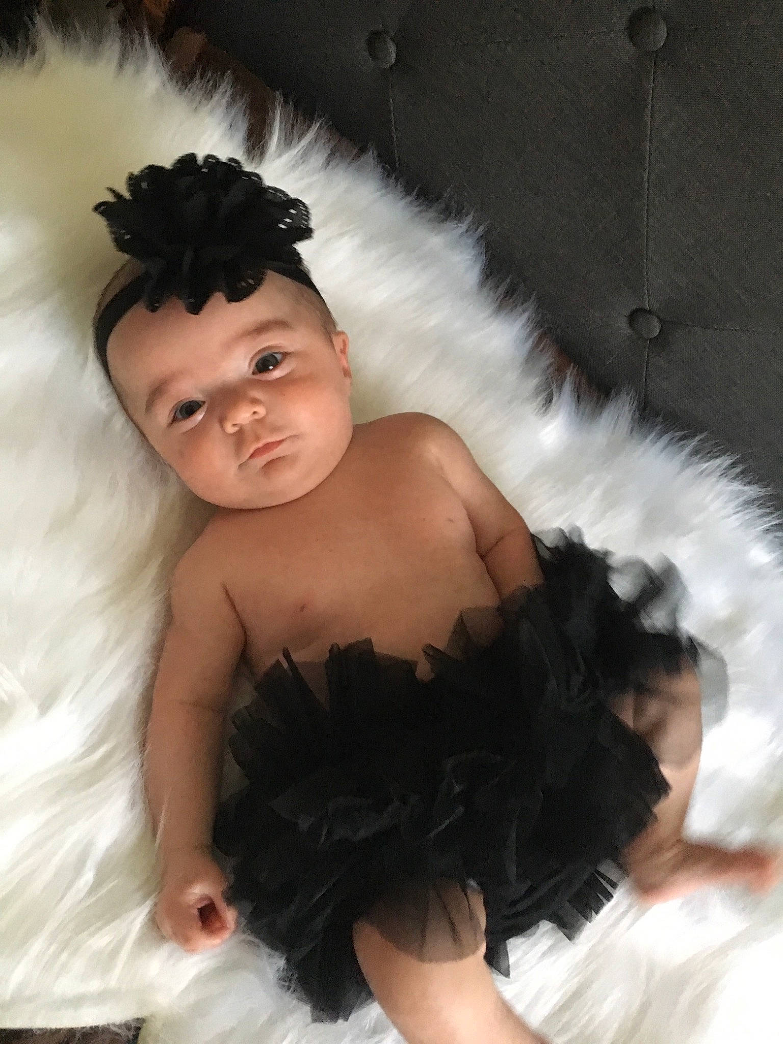 Julia joined the competition — help win amazing prizes! baby, black_and_white, black_hair, child, child_model, costume, costume_accessory, dress, fashion_accessory, feather_boa, fur, hair_accessory, headpiece, person, photo_shoot, photography, skin, toddler, white