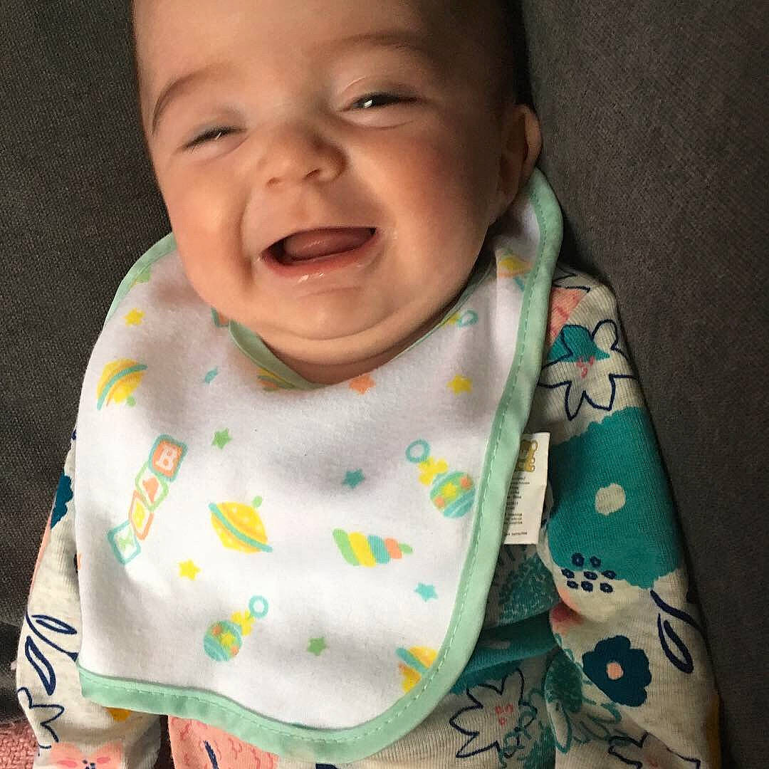 Julia is registered to the contest to win money with this photo: baby, baby_toddler_clothing, beauty, bib, cheek, child, cool, face, facial_expression, happy, head, laugh, lip, mouth, neck, nose, person, product, skin, smile