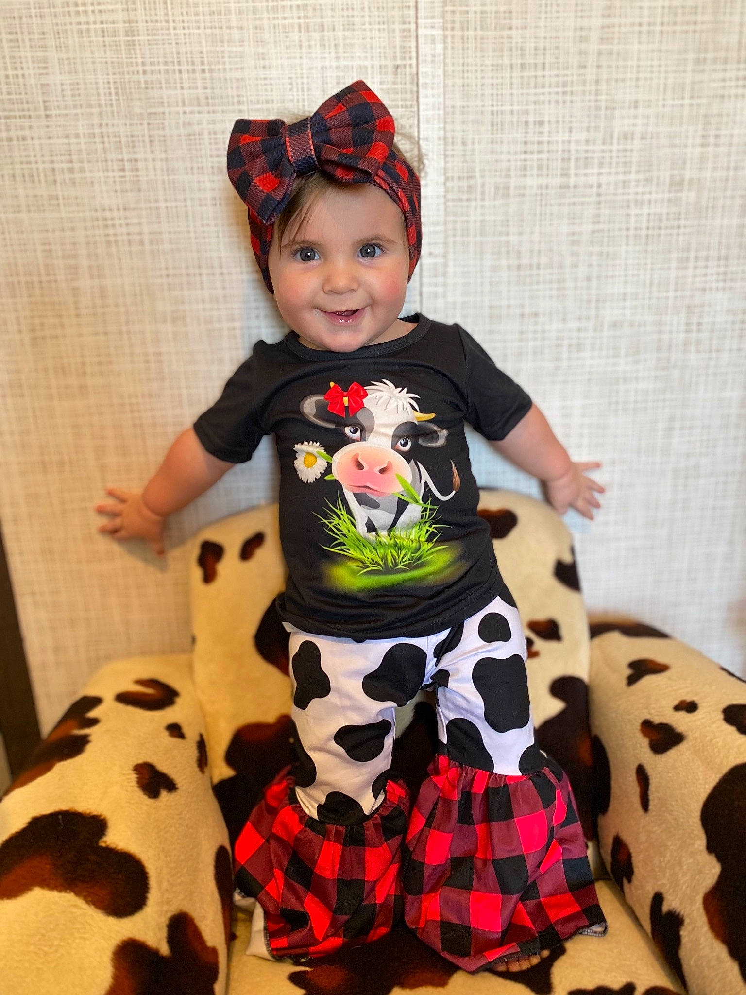 Kodie joined the competition — help win amazing prizes! baby_toddler_clothing, child, fashion, fashion_design, fun, happy, hat, head, headwear, joy, mammal, neck, outerwear, pattern, person, sitting, sleeve, smile, t_shirt, textile