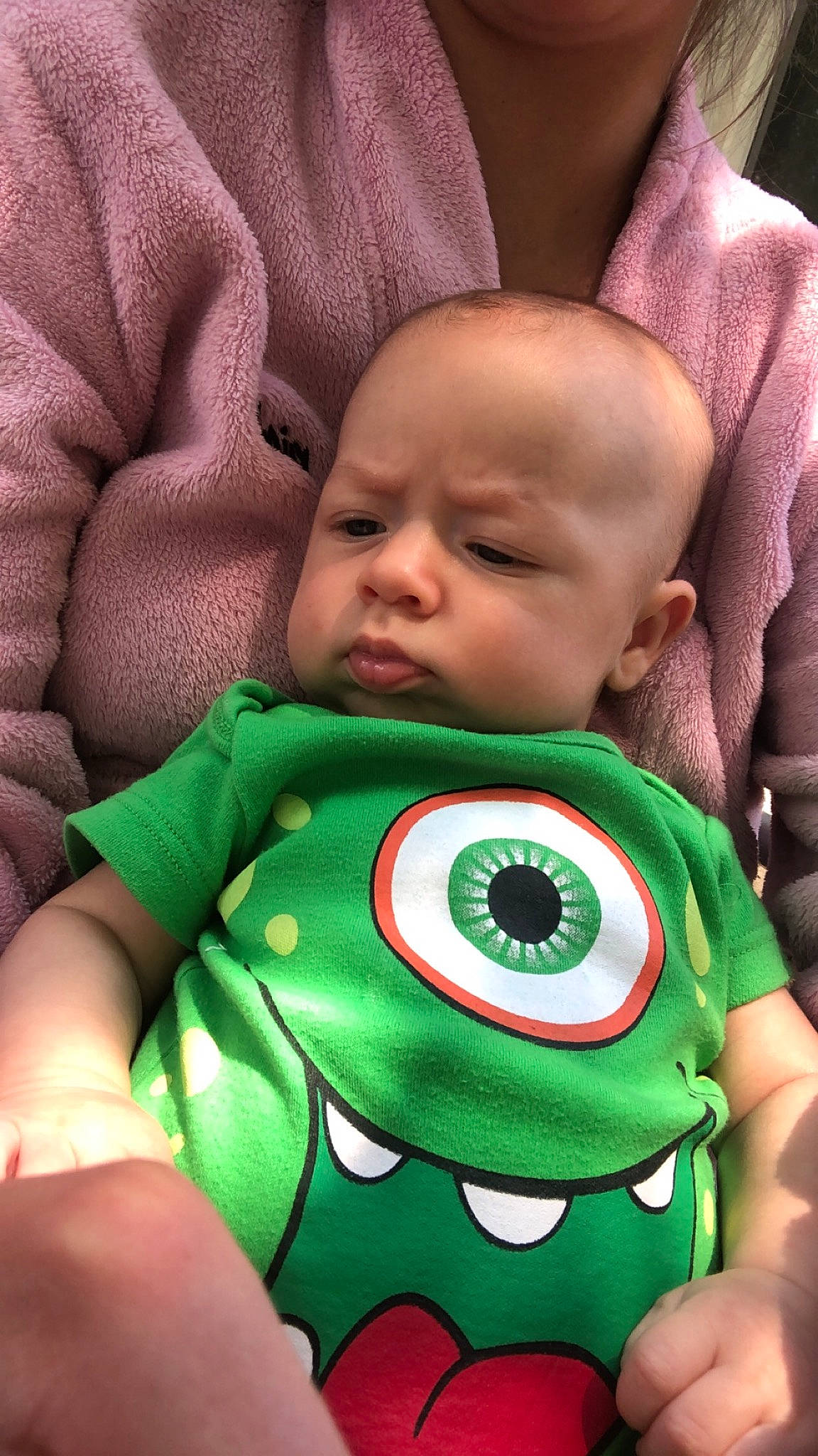 Cayden is registered to the contest to win money with this photo: baby, baby_toddler_clothing, cheek, chin, comfort, eye, face, finger, green, happy, head, iris, mouth, nose, organ, person, product, skin, sleeve, textile