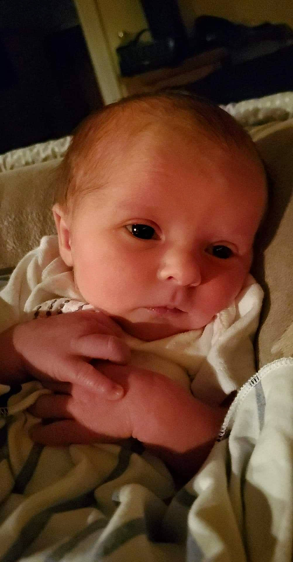 Lily Rae is registered to the contest to win money with this photo: baby, cheek, child, chin, eye, eyebrow, face, facial_expression, finger, forehead, hand, head, iris, lip, mouth, nose, person, skin, smile, thumb