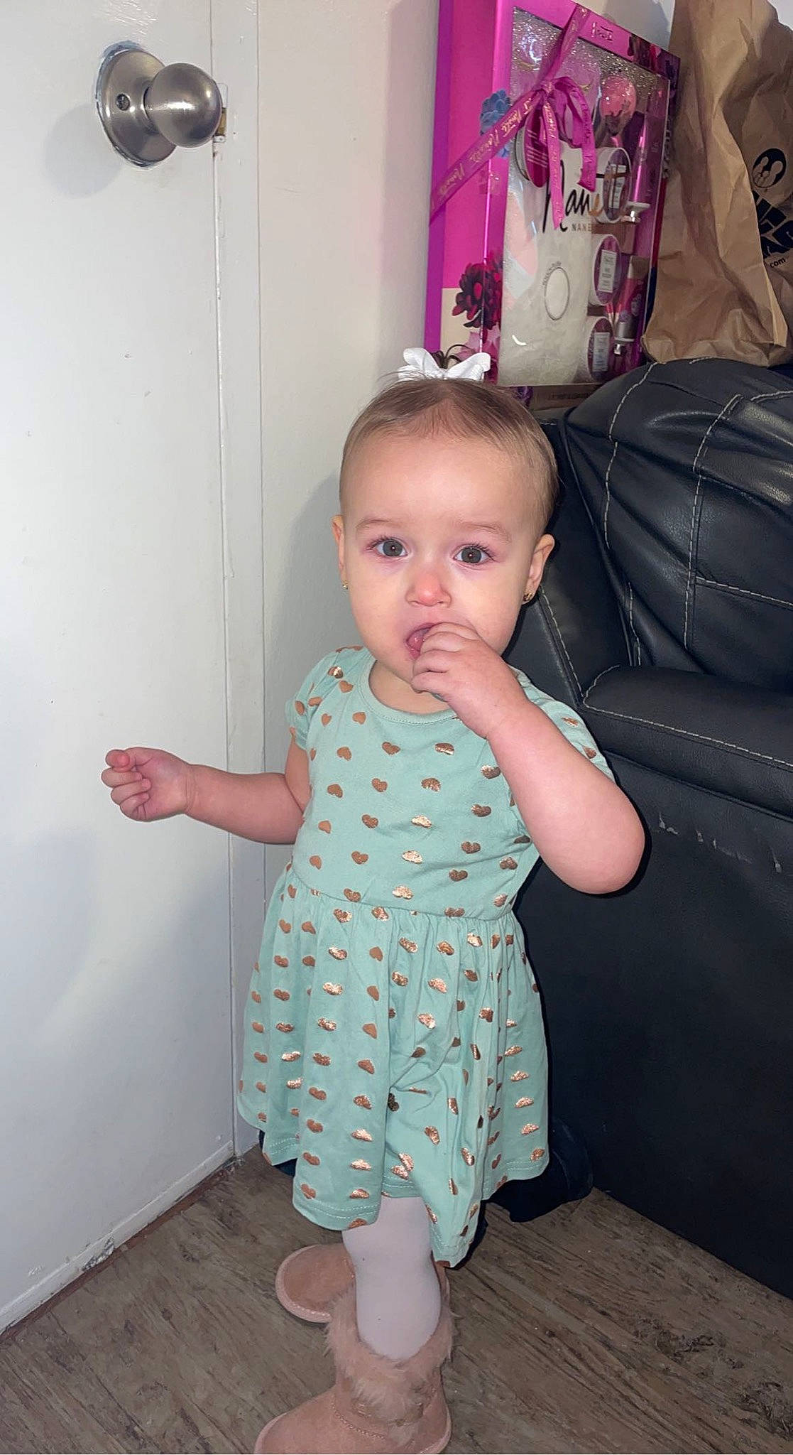 Ilyana is registered to the contest to win money with this photo: baby, baby_toddler_clothing, day_dress, dress, eye, face, finger, floor, flooring, fun, hand, joint, one_piece_garment, person, pink, skin, sleeve, thumb, toddler, waist