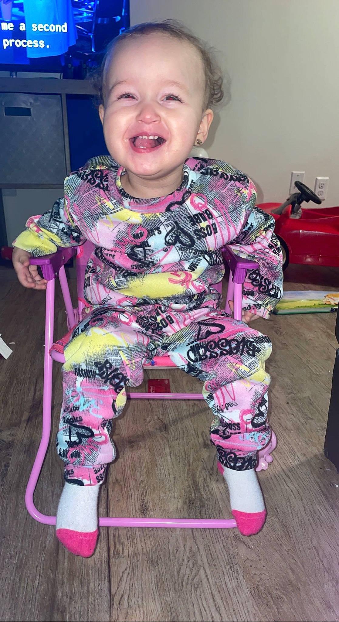 Ilyana joined the competition — help win amazing prizes! baby_toddler_clothing, cheek, cool, facial_expression, fun, happy, head, human_body, iris, luggage_and_bags, magenta, neck, person, pink, purple, sleeve, smile, standing, t_shirt, thigh