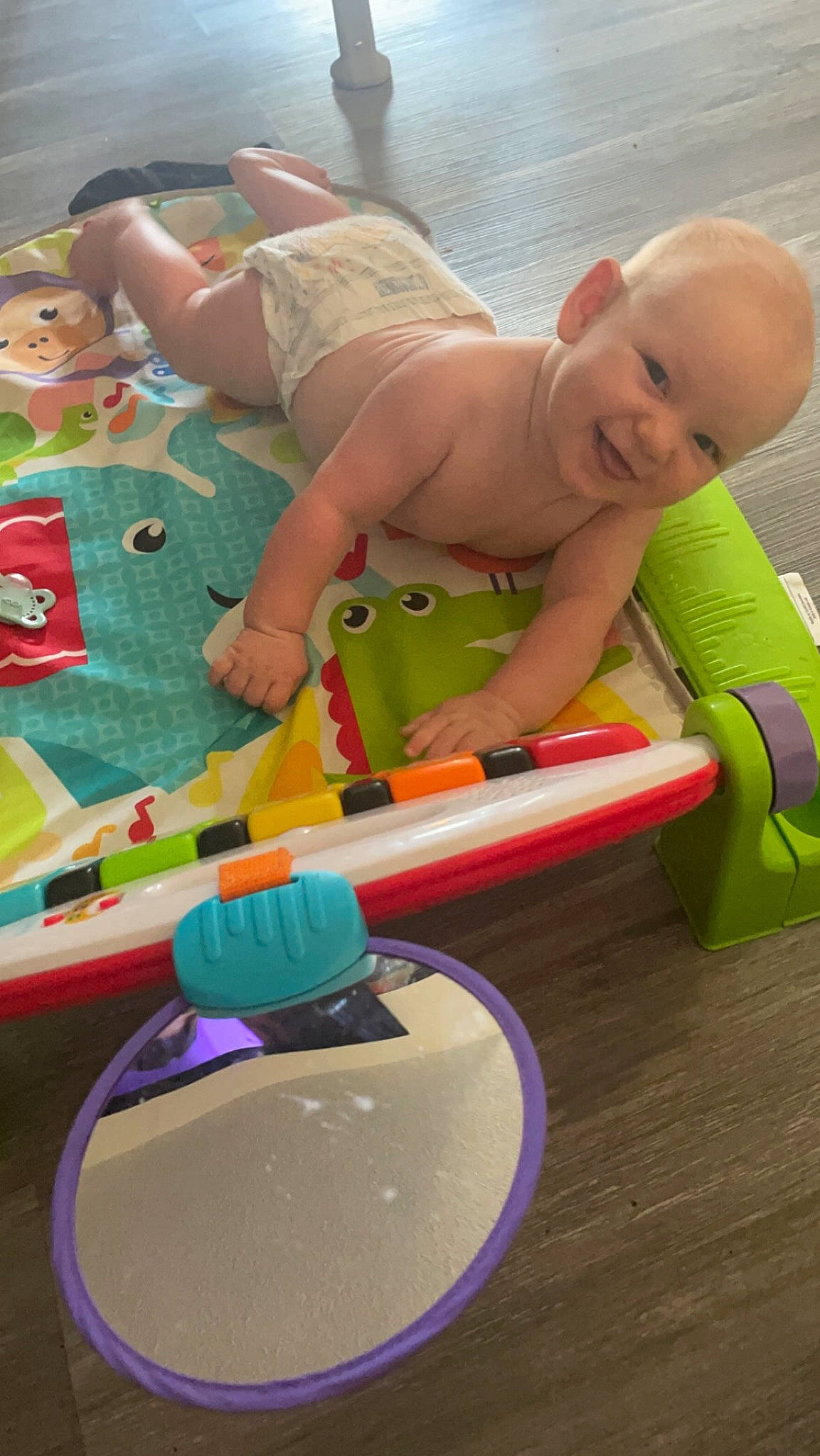 Atticus is registered to the contest to win money with this photo: baby, baby_mobile, baby_playing_with_toys, baby_products, baby_safety, baby_toddler_clothing, baby_toys, child, comfort, flooring, fun, leisure, person, plastic, play, product, recreation, room, sitting, toddler