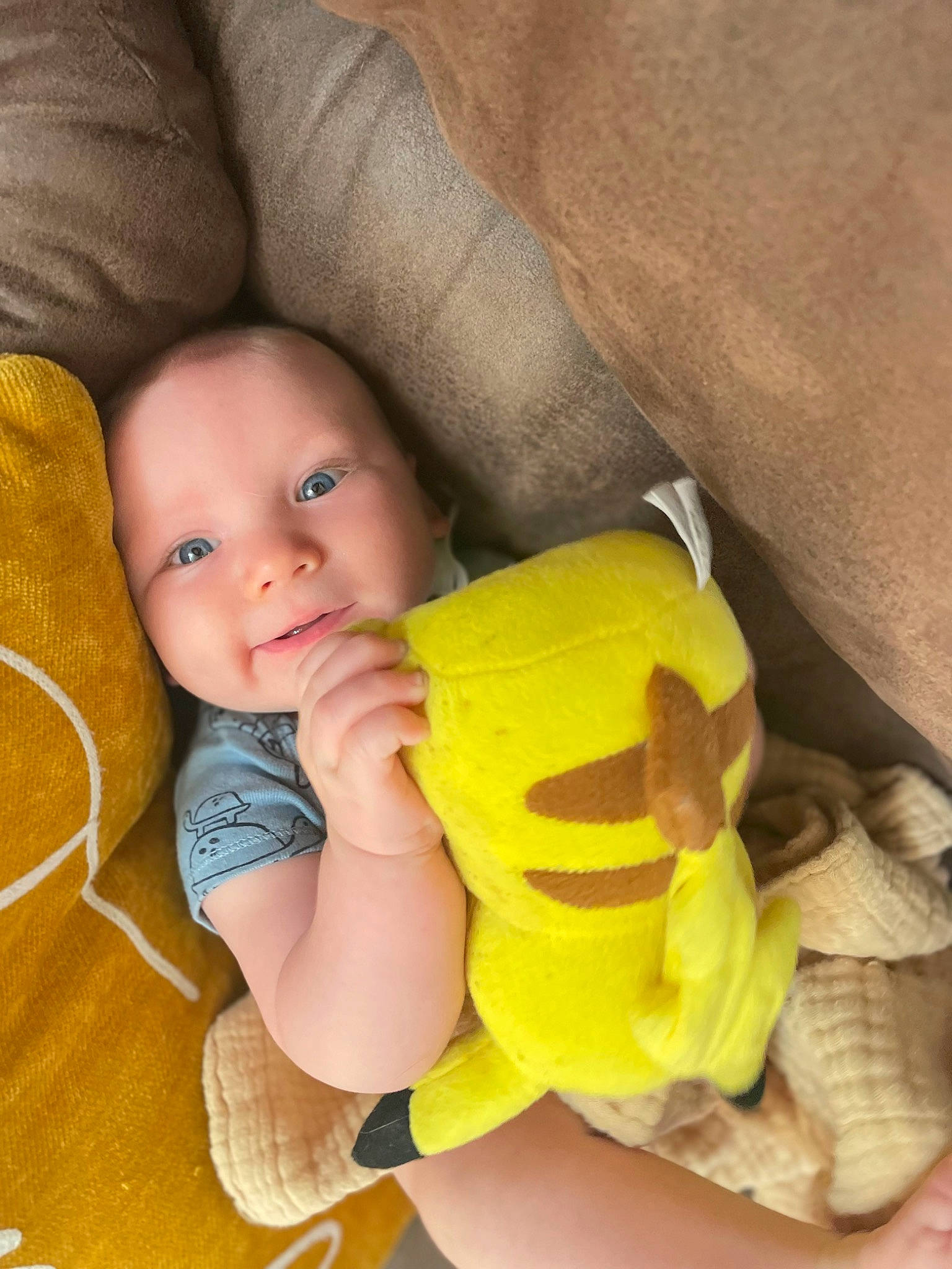 Atticus is registered to the contest to win money with this photo: baby, baby_products, baby_toddler_clothing, cheek, child, comfort, eye, gesture, happy, iris, mouth, nail, nose, person, sitting, skin, stuffed_toy, thumb, toddler, toy