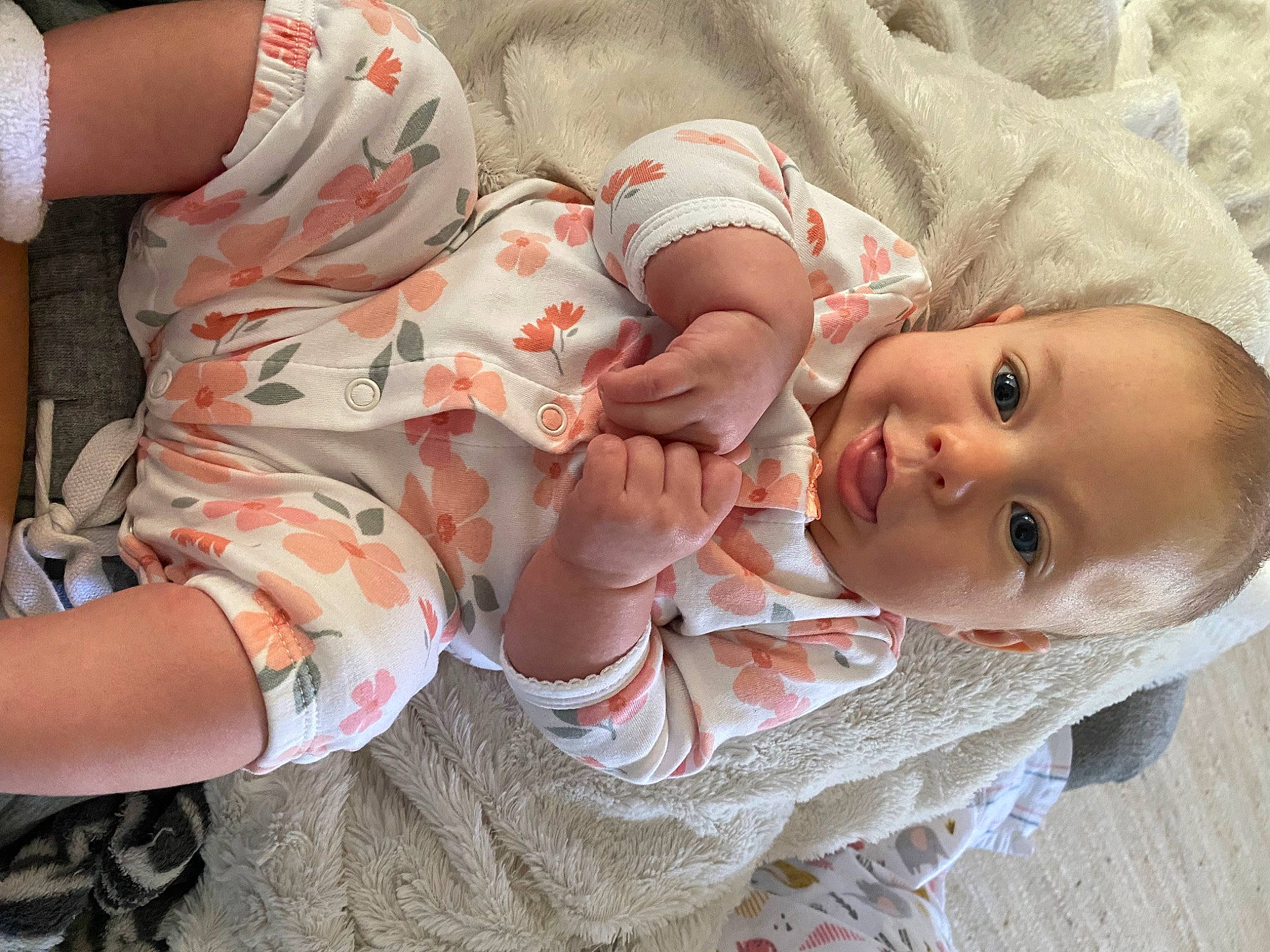Layla is registered to the contest to win money with this photo: baby, baby_products, baby_toddler_clothing, cheek, child, comfort, eye, finger, gesture, hand, happy, lip, mouth, nail, nose, person, skin, sleeve, smile, thumb