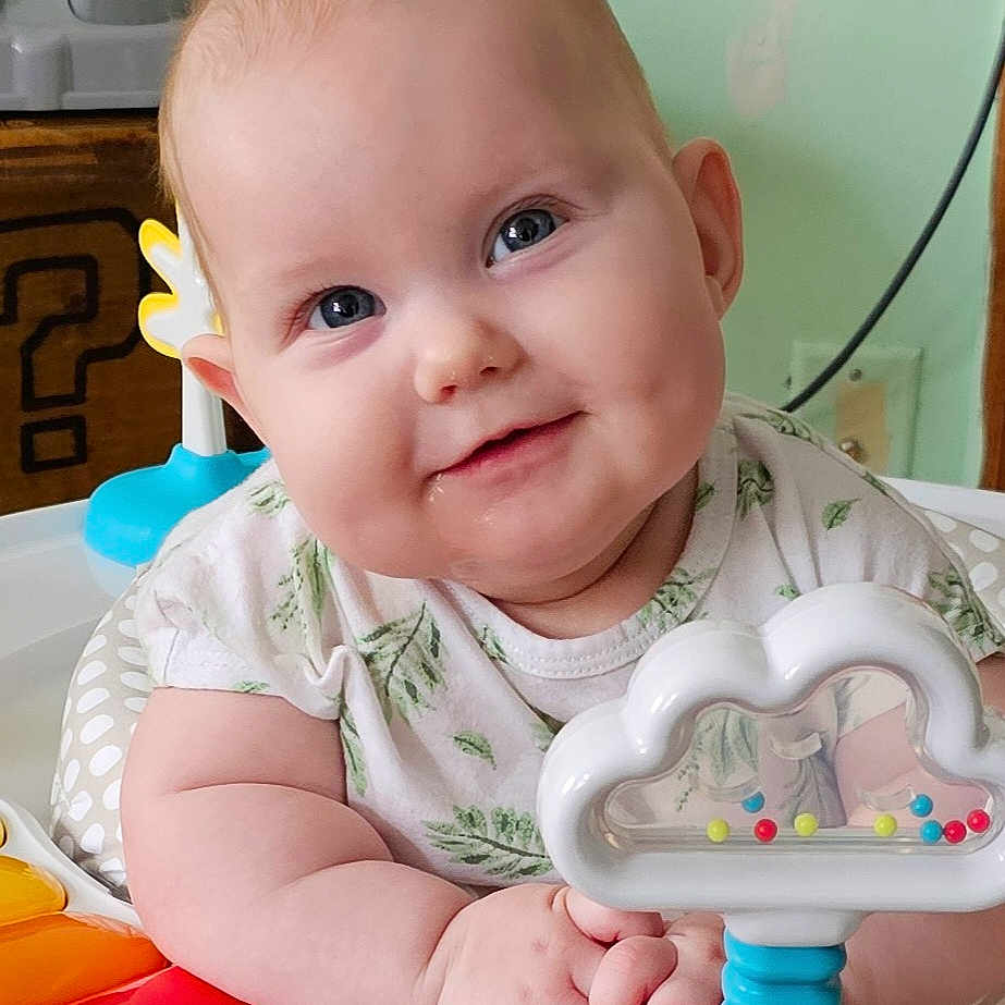 Lilliahna joined the competition — help win amazing prizes! baby, bodypart, clothing, cream, dessert, face, finger, food, furniture, happy, head, icing, indoors, person, photography, portrait, sitting, smile, t_shirt, toy