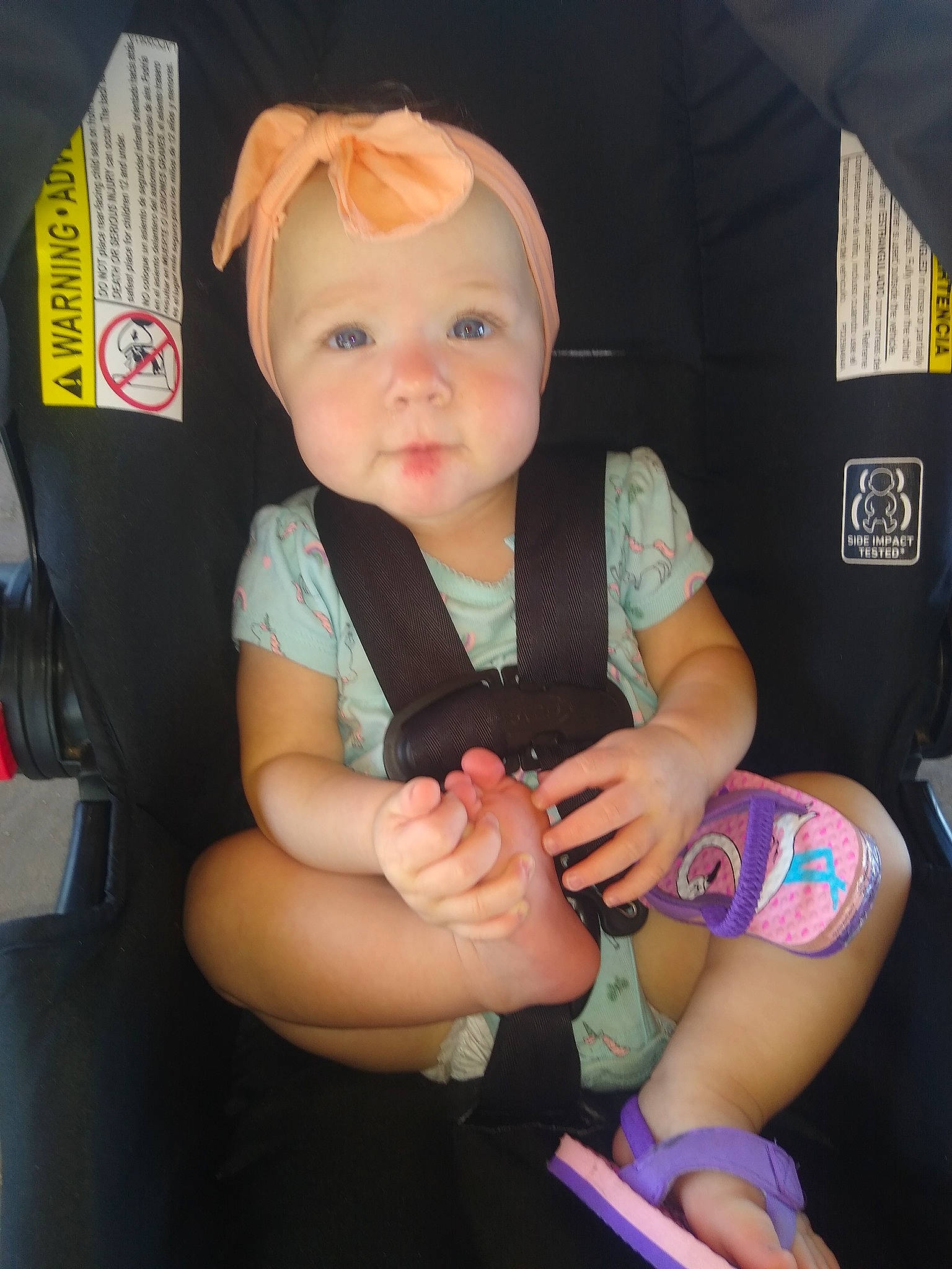 Lacy is registered to the contest to win money with this photo: arm, baby, cheek, child, cool, elbow, eye, finger, hand, headwear, leg, nail, person, product, skin, thumb, toddler, vacation