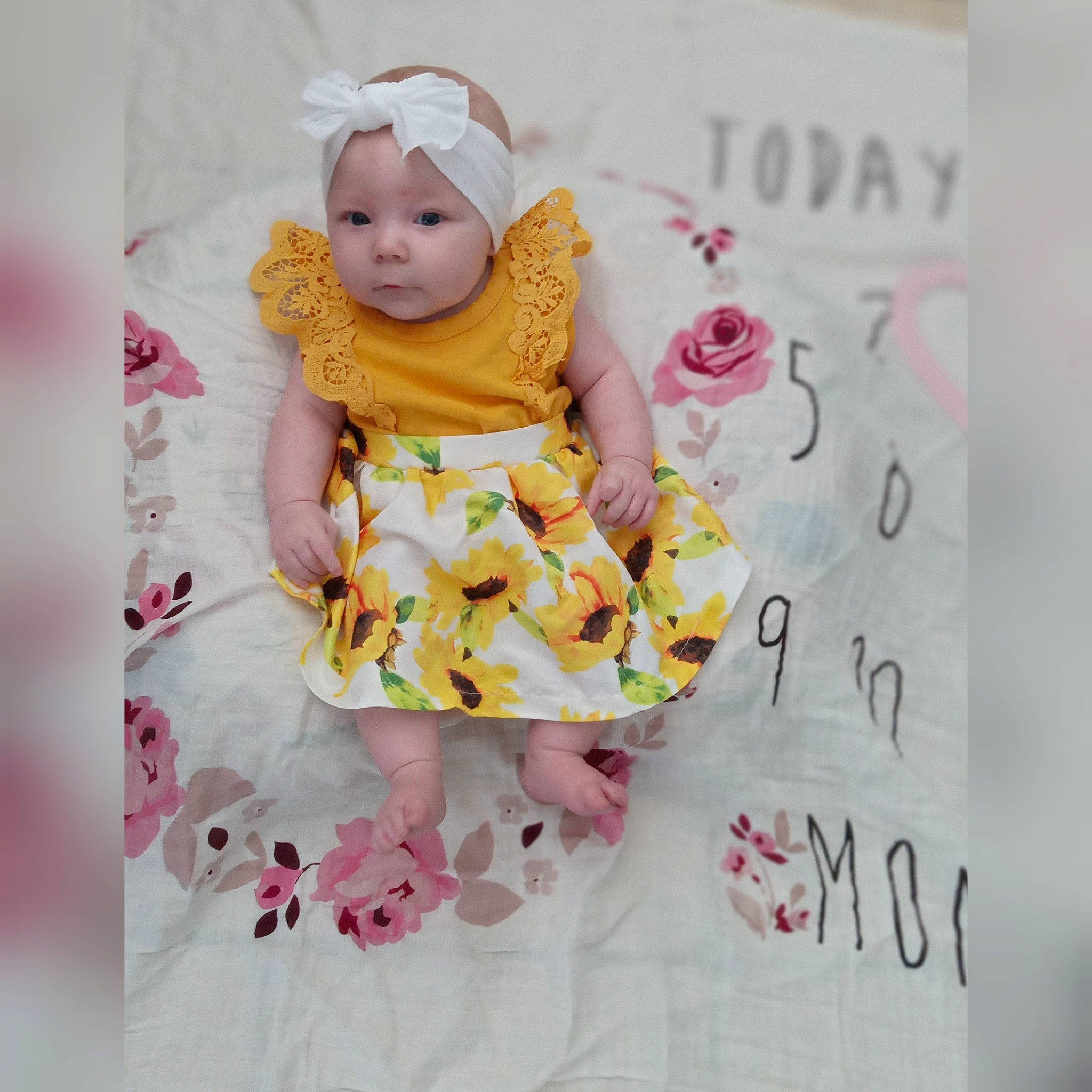 Lilli'Annah is registered to the contest to win money with this photo: baby, baby_products, baby_toddler_clothing, child, comfort, dress, font, happy, headwear, illustration, linens, magenta, pattern, peach, person, petal, pink, product, sitting, sleeve