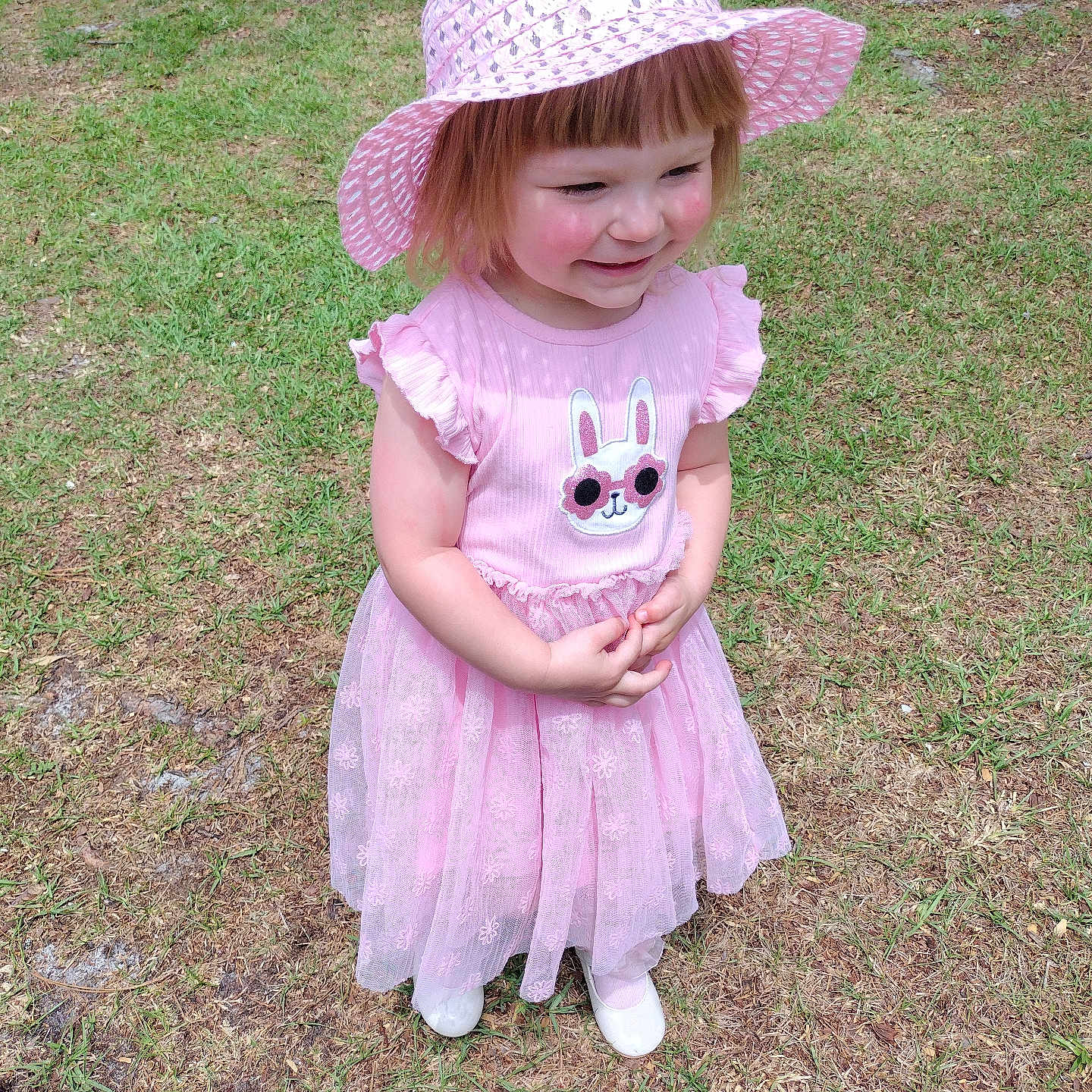 Lilli'Annah is registered to the contest to win money with this photo: bonnet, cap, child, clothing, costume, dress, face, female, footwear, girl, grass, hat, head, lawn, person, photography, plant, portrait, shoe, sunhat