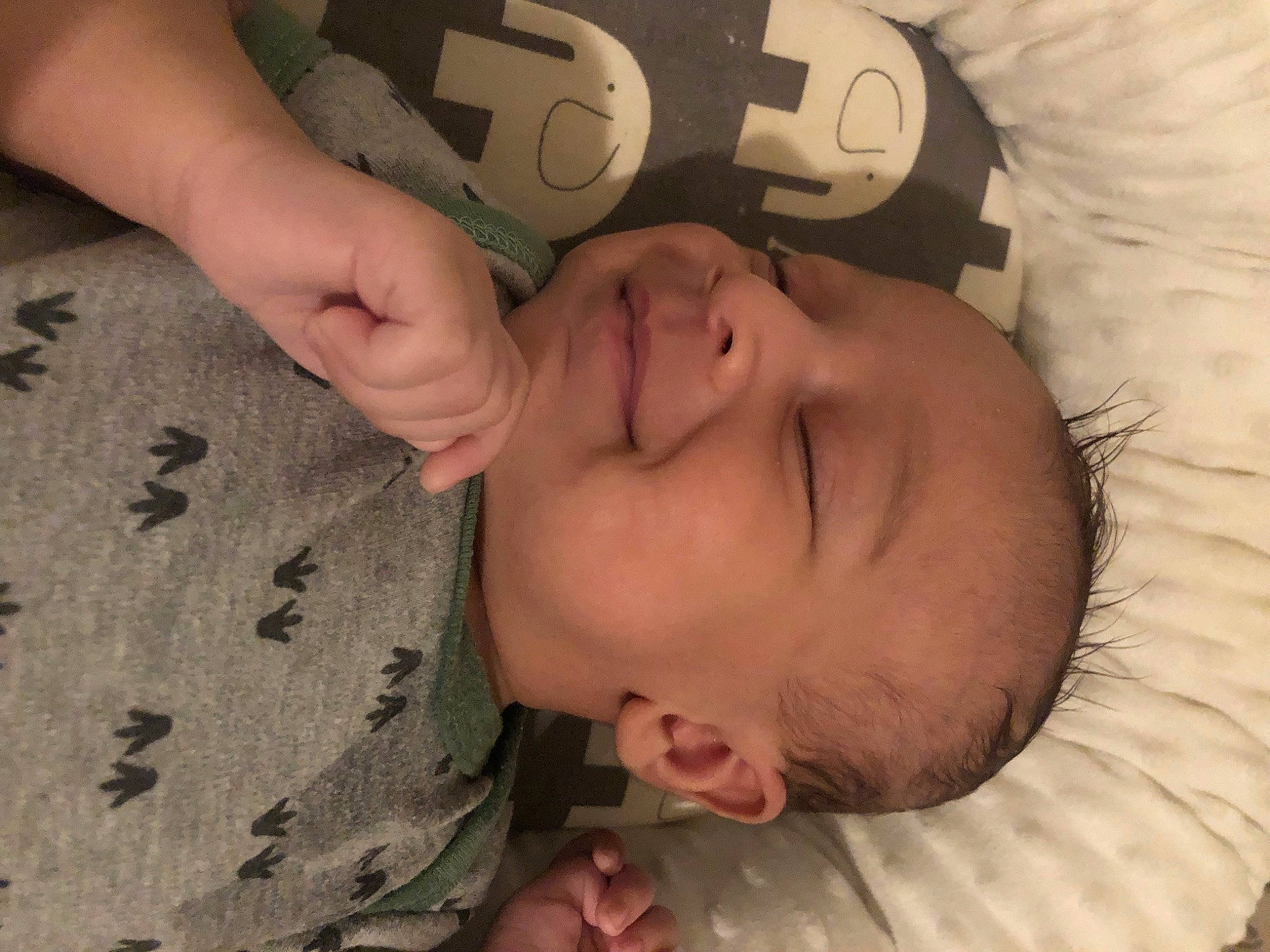 Kymani joined the competition — help win amazing prizes! arm, baby, cheek, comfort, ear, eye, eyelash, face, finger, gesture, hair, hand, happy, head, mammal, military_camouflage, mouth, nose, person, skin