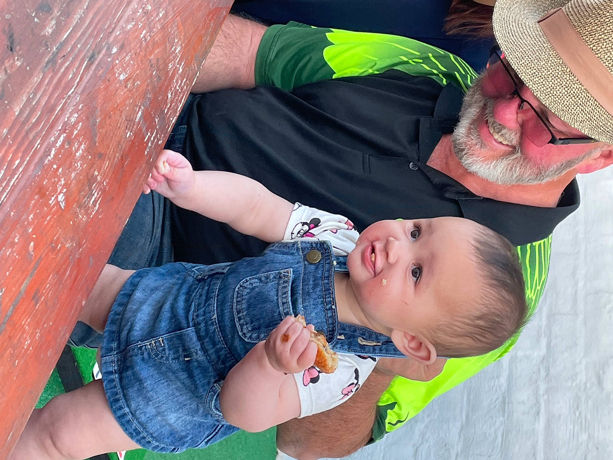 Rebecca is registered to the contest to win money with this photo: arm, baby, baby_toddler_clothing, fedora, finger, fun, glasses, grass, green, hand, happy, hat, headwear, joy, mouth, organ, person, red, skin, smile