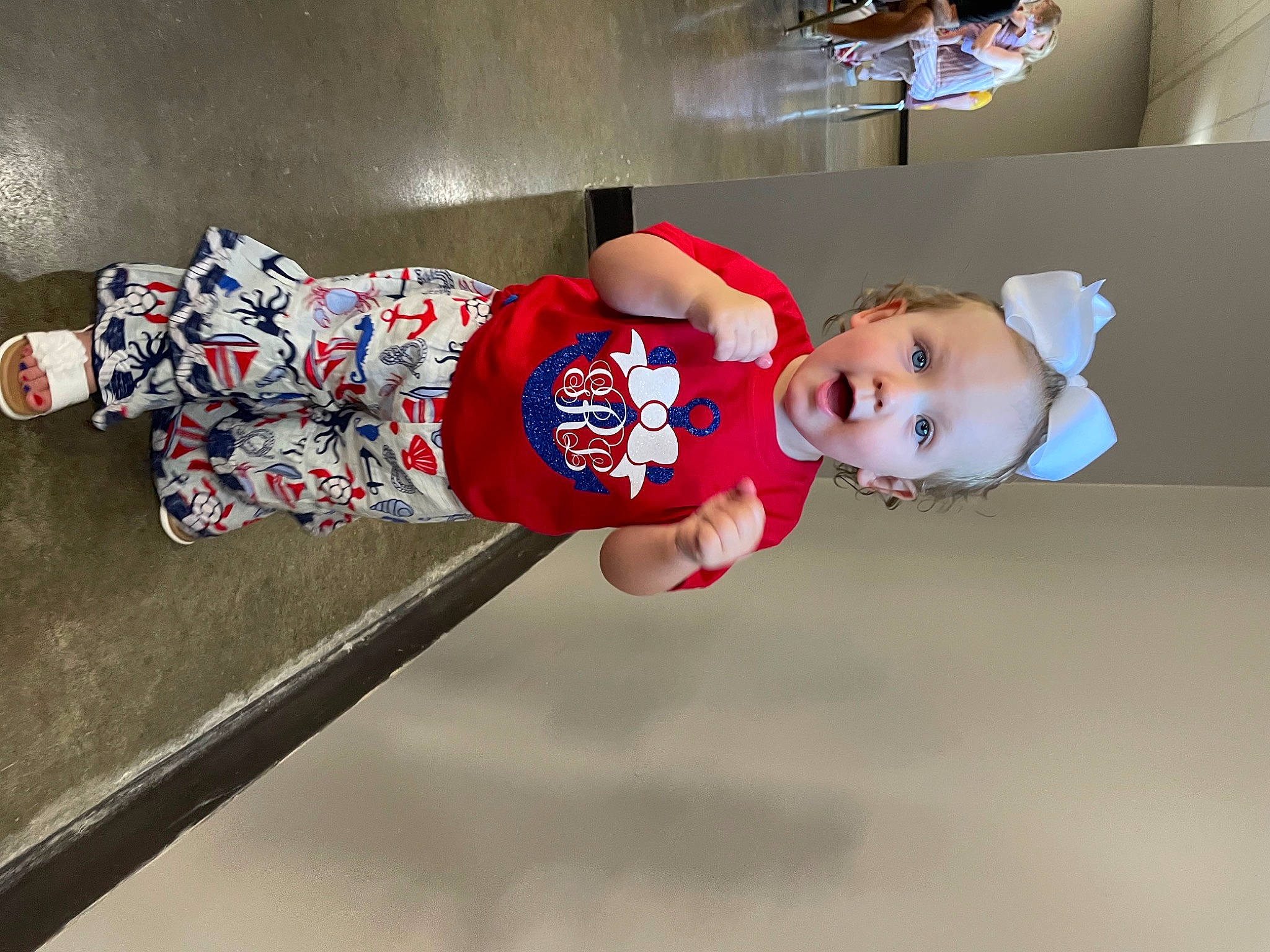 Gabby joined the competition — help win amazing prizes! baby, baby_toddler_clothing, carmine, child, costume, flooring, fun, happy, hat, human_leg, knee, person, room, sleeve, smile, surprise, thigh, toddler