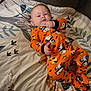 Kayson is registered to the contest to win money with this photo: baby, bed, bedroom, blanket, bodypart, clothing, couch, cradle, crib, cushion, face, finger, furniture, glove, hand, hat, head, homedecor, indoors, infantbed
