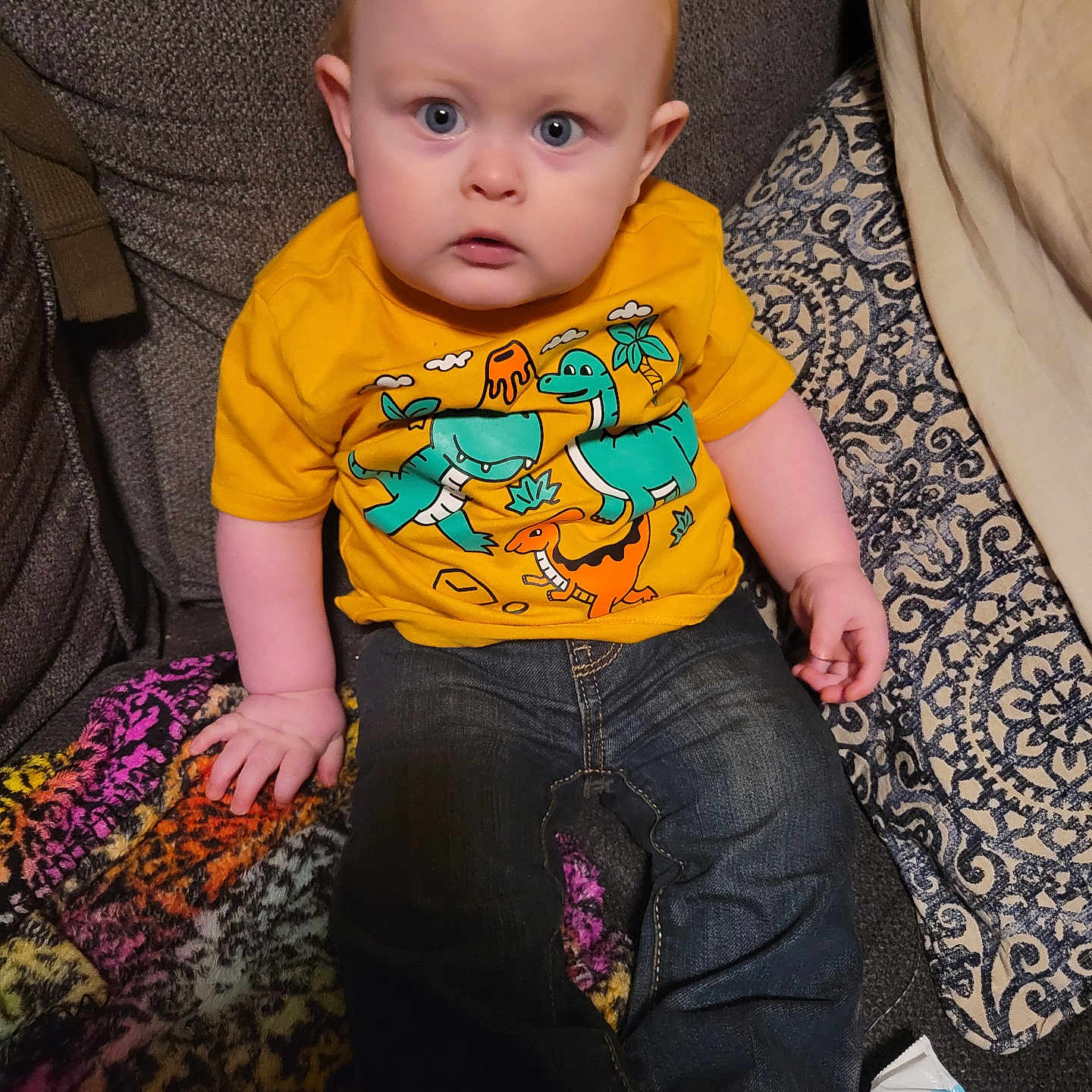 Kayson is registered to the contest to win money with this photo: accessories, applique, architecture, baby, bag, bed, bodypart, building, chair, clothing, couch, crawling, cushion, face, finger, footwear, frown, furniture, hand, handbag
