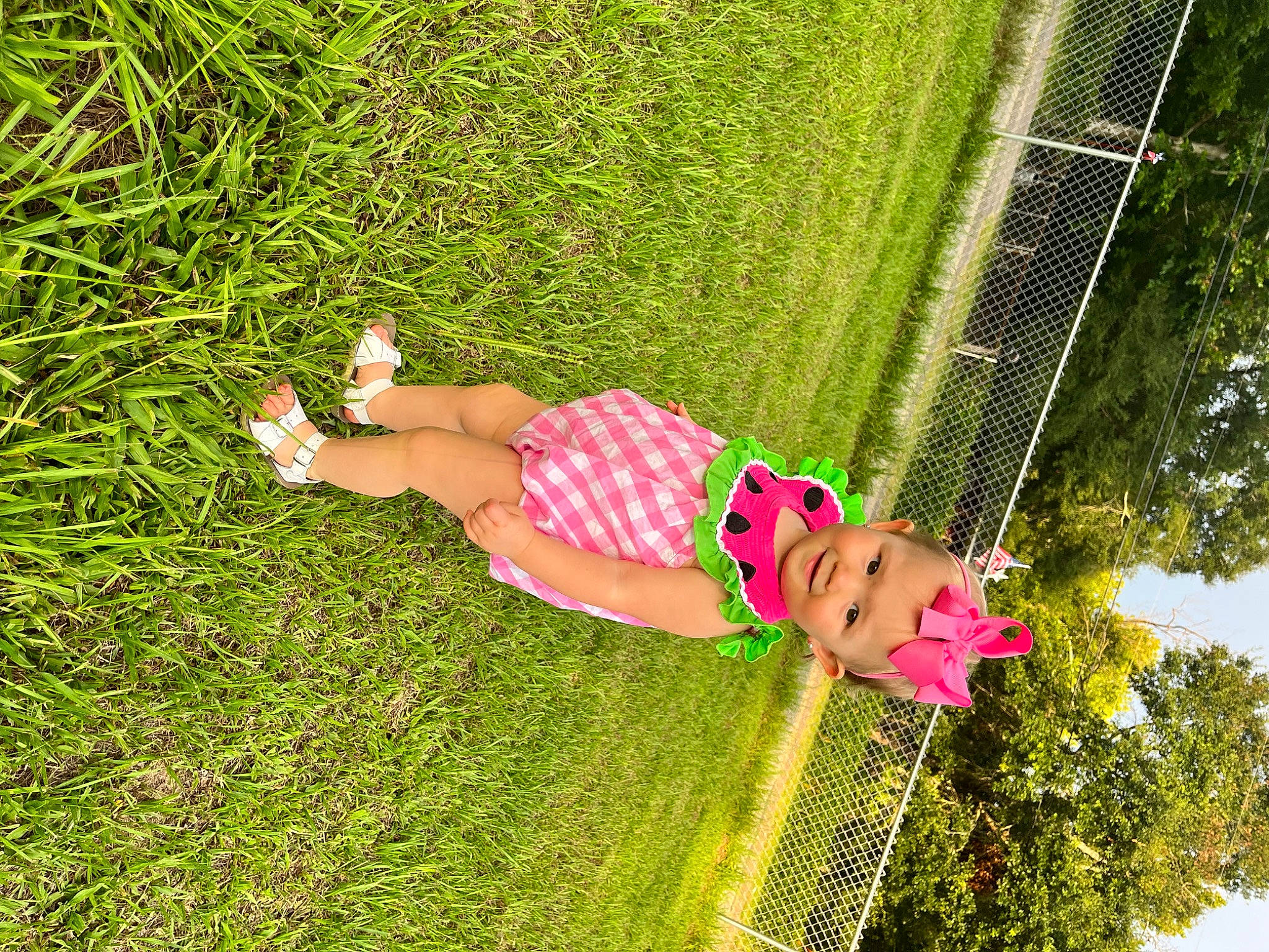 Haven is registered to the contest to win money with this photo: fun, grass, grass_family, grassland, happy, headwear, human_body, human_leg, joy, knee, landscape, lawn, leisure, magenta, pattern, people_in_nature, person, plant, recreation, thigh