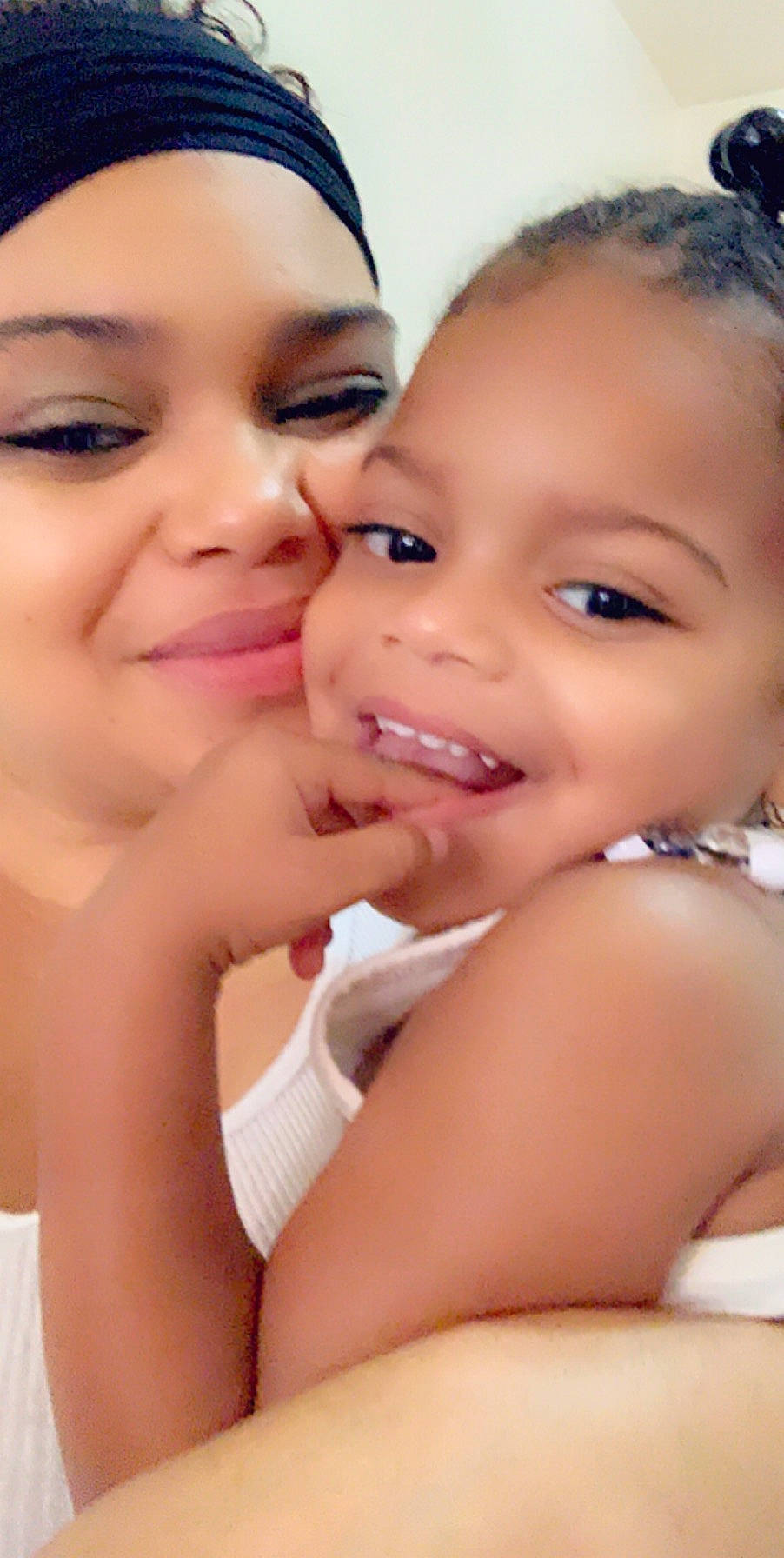 Aleyah is registered to the contest to win money with this photo: beauty, cheek, child, chin, close_up, eyebrow, face, forehead, fun, gesture, happy, head, interaction, joy, lip, mother, mouth, nose, person, skin