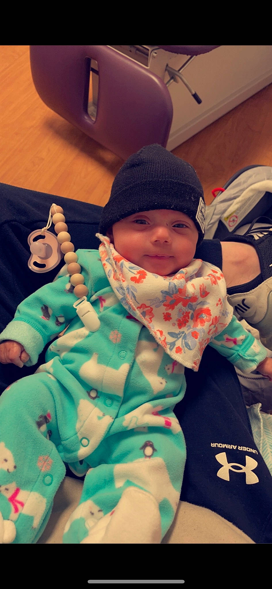 Oaklee joined the competition — help win amazing prizes! baby, baby_products, baby_toddler_clothing, beanie, cap, car_seat, cheek, child, comfort, fun, gesture, happy, headwear, outerwear, pattern, person, personal_protective_equipment, sitting, skin, thumb