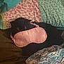 Ally is registered to the contest to win money with this photo: animal, bed, black_cat, blanket, cat, colorful, comfort, cozy, cute, domestic, fabric, indoor, nap, pattern, pet, pillow, resting, sleep_mask, sleeping, soft