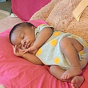 Jamari joined the competition — help win amazing prizes! baby, sleeping, blanket, pink, teddy_bear, stuffed_animal, infant, cozy, cute, child, soft, couch, furniture, resting, indoors, peaceful, adorable, person, laying, comfort