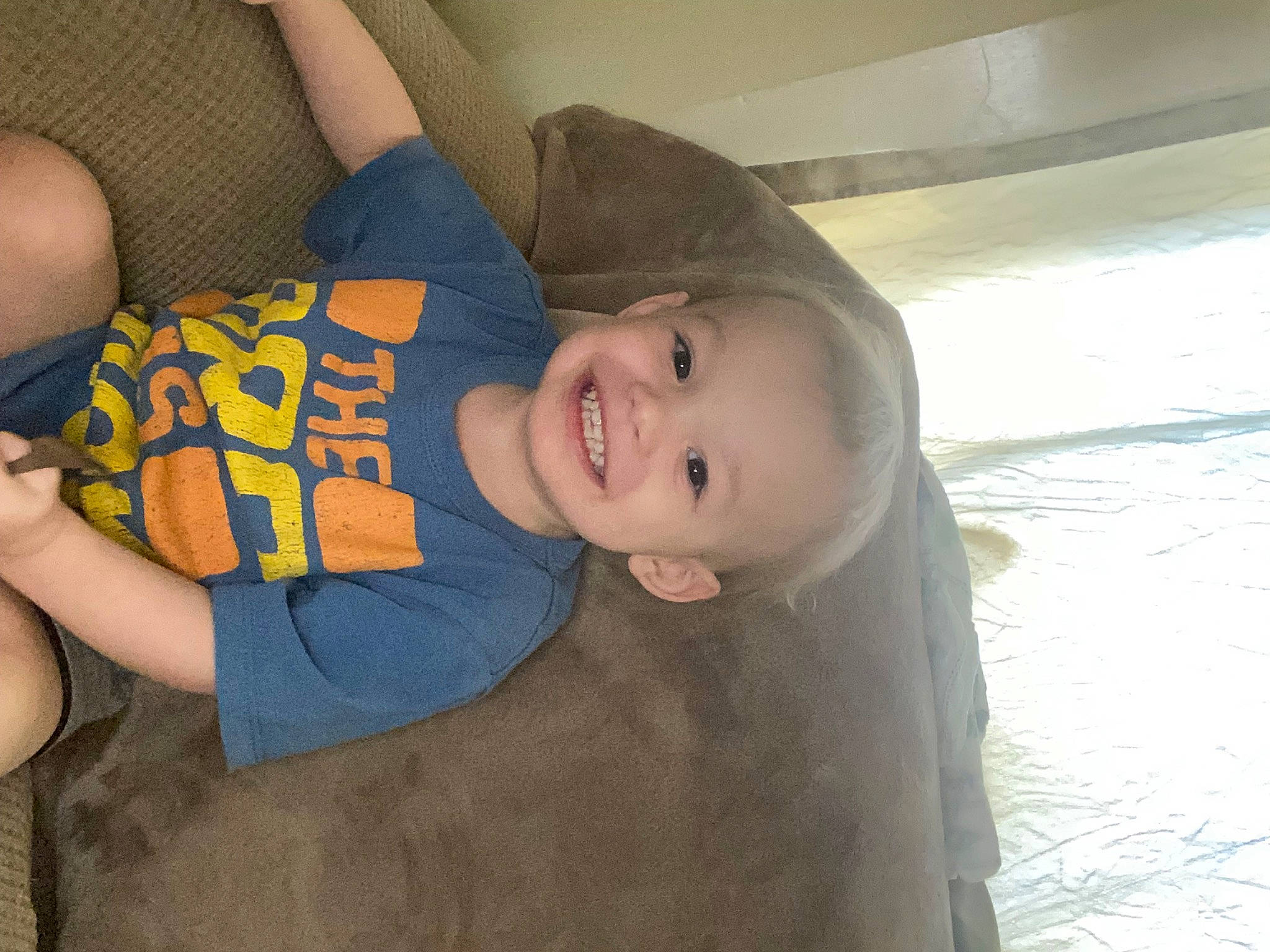 Tanner is registered to the contest to win money with this photo: baby_toddler_clothing, elbow, eye, face, flash_photography, fun, gesture, happy, hat, headgear, human_body, human_leg, joy, knee, mouth, person, sleeve, smile, thigh, toddler