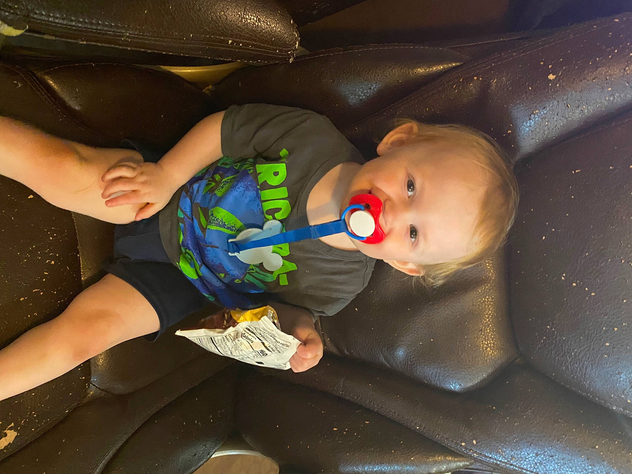 Tyson is registered to the contest to win money with this photo: auto_part, baby, baby_products, baby_toddler_clothing, calf, car_seat, child, comfort, elbow, finger, foot, fun, hand, human_leg, knee, lap, nail, person, sitting, thigh