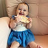 baby, child, smiling, blue_skirt, headband, plush_chair, milestone, happy, portrait, sitting, cute, infant, one_month, clothing, person, indoors, skin, face, hand, foot