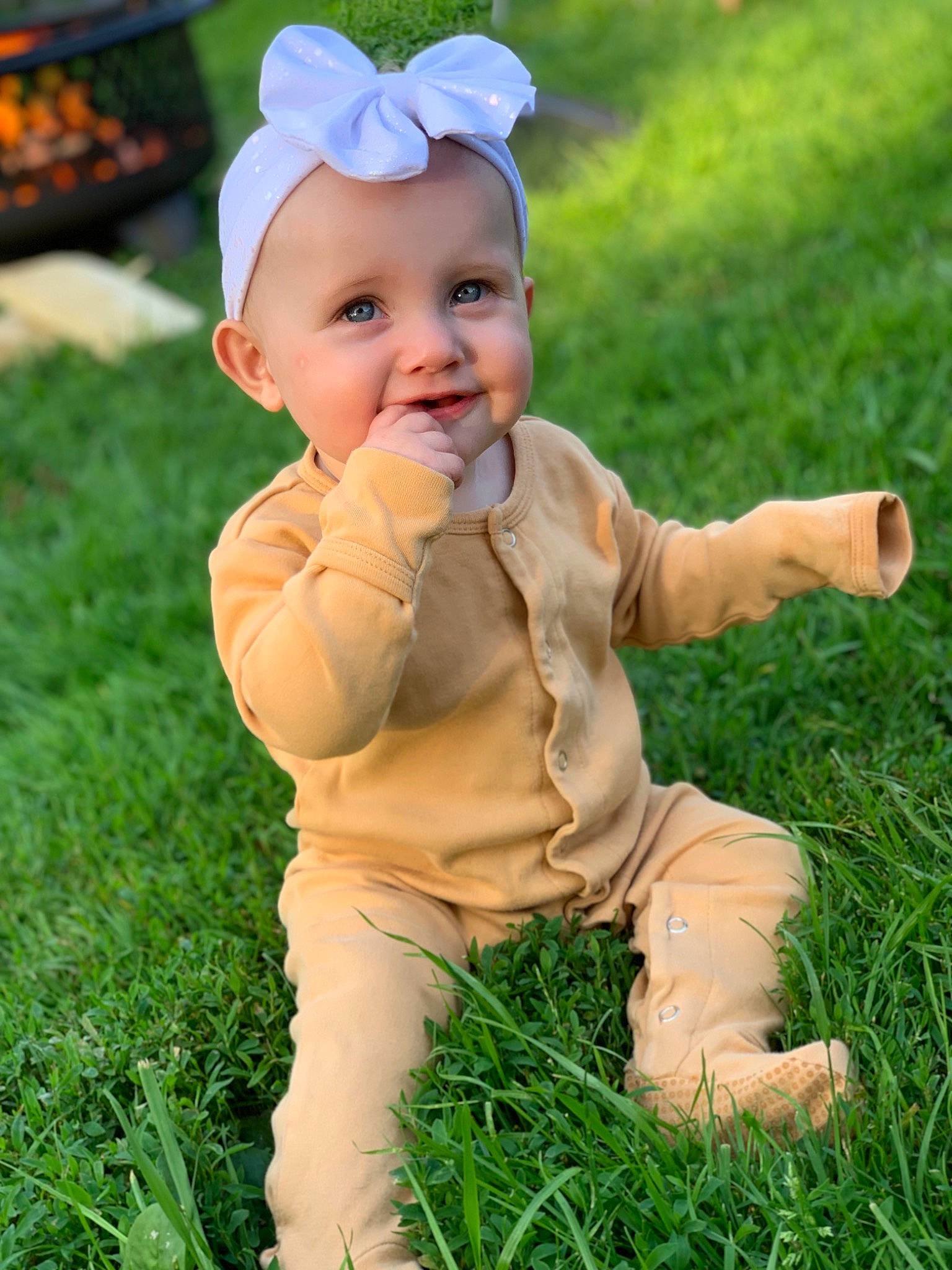Kynzlee joined the competition — help win amazing prizes! baby, baby_toddler_clothing, child, child_model, finger, grass, happy, headgear, lawn, people_in_nature, person, plant, play, skin, smile, toddler