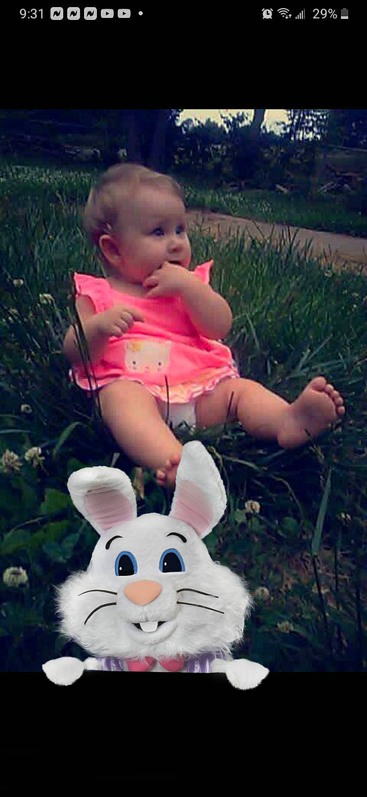 Karly joined the competition — help win amazing prizes! arm, baby, baby_toddler_clothing, botany, fawn, grass, green, hand, happy, light, mammal, people_in_nature, person, photograph, pink, plant, rabbit, rabbits_and_hares, skin, toddler