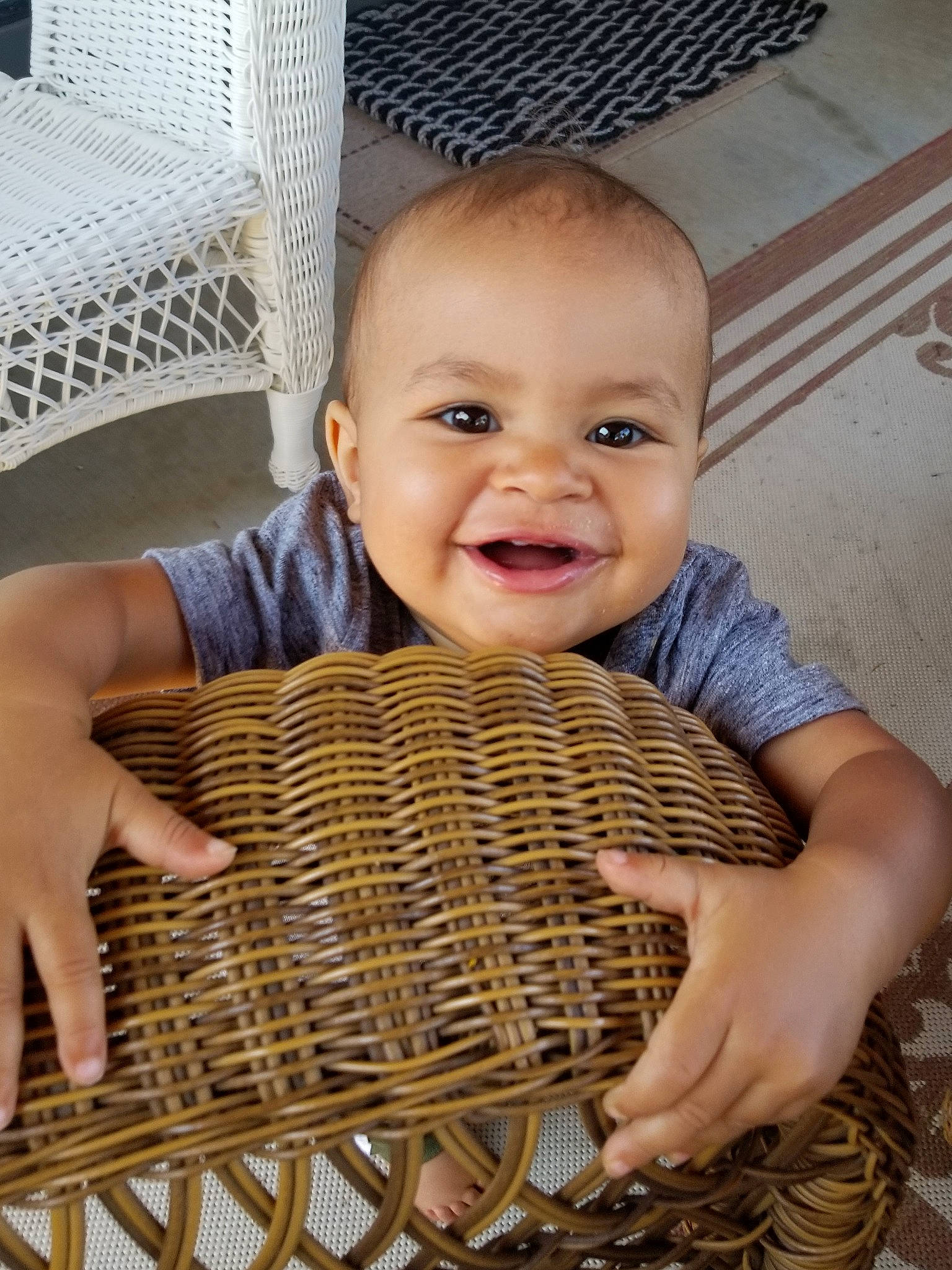 Dane is registered to the contest to win money with this photo: baby, baby_products, basket, child, face, hand, head, people, person, product, skin, smile, toddler, wicker