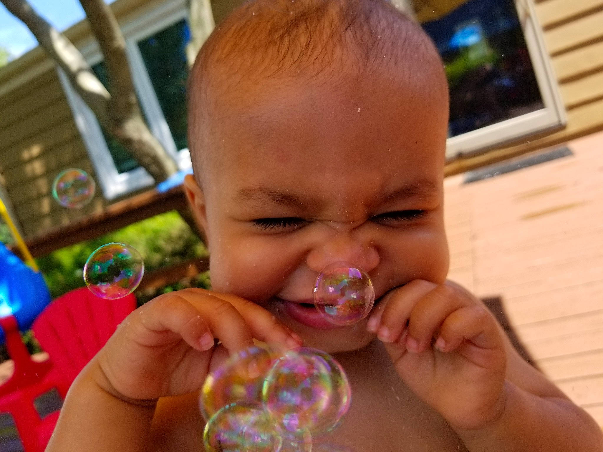 Dane is registered to the contest to win money with this photo: baby, child, ear, eye, face, finger, fun, hand, head, joy, nose, person, play, smile, thumb, toddler