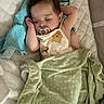 Evelyn is registered to the contest to win money with this photo: baby, sleeping, pacifier, blanket, bed, infant, portrait, face, closed_eyes, indoors, bedding, turquoise_blanket, green_blanket, polka_dots, onesie, winnie_the_pooh, resting, cozy, nursery, nap_time