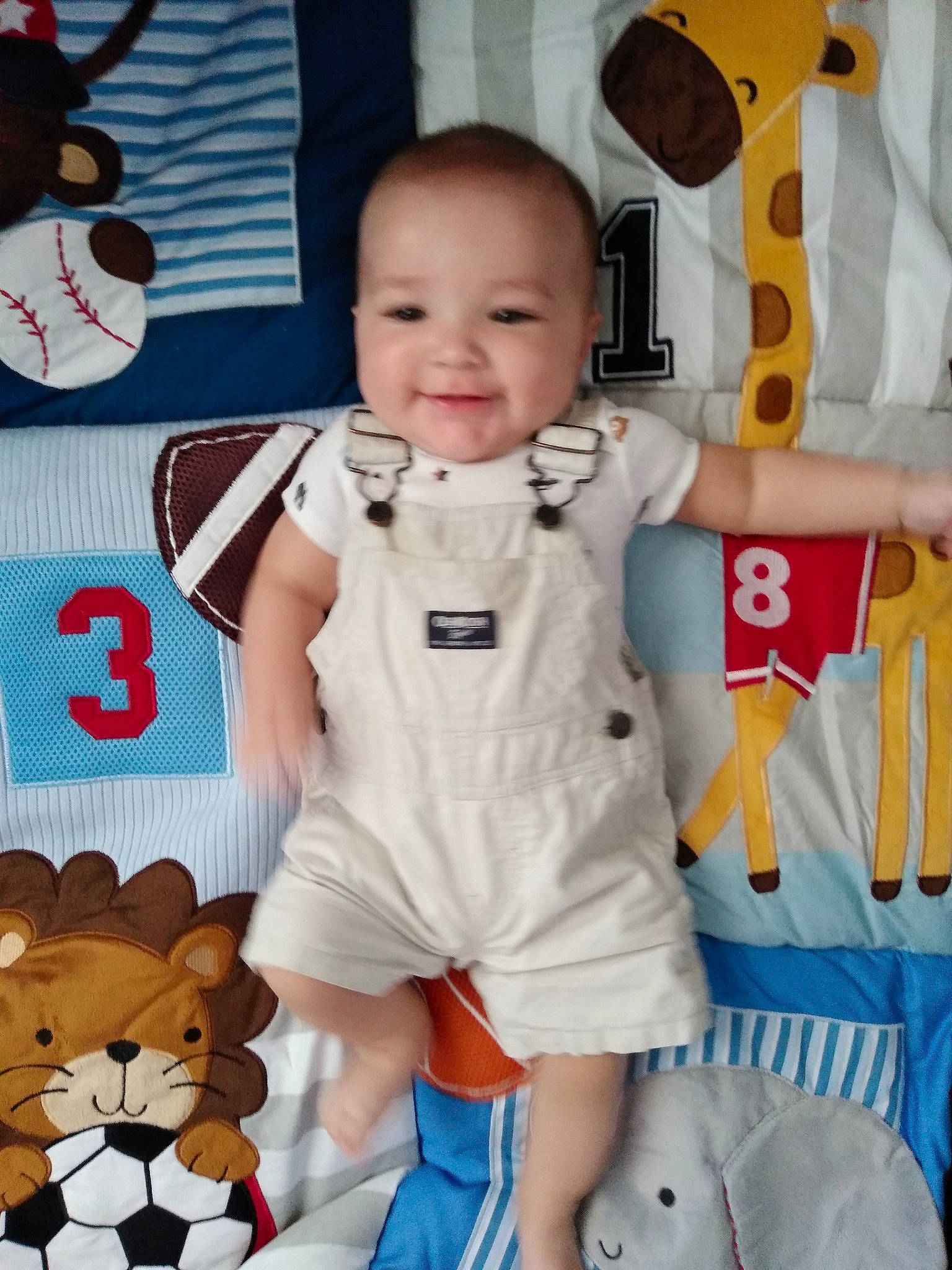 Leland is registered to the contest to win money with this photo: baby, baby_products, baby_toddler_clothing, child, joy, person, play, product, room, smile, textile, toddler