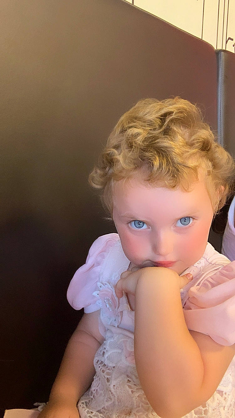 Dinara participe au concours pour gagner de l'argent avec cette photo : blond, bridal_accessory, brown_hair, cheek, day_dress, doll, dress, eyelash, fashion_design, flash_photography, gesture, happy, headpiece, iris, jewellery, lip, long_hair, makeover, person, toy