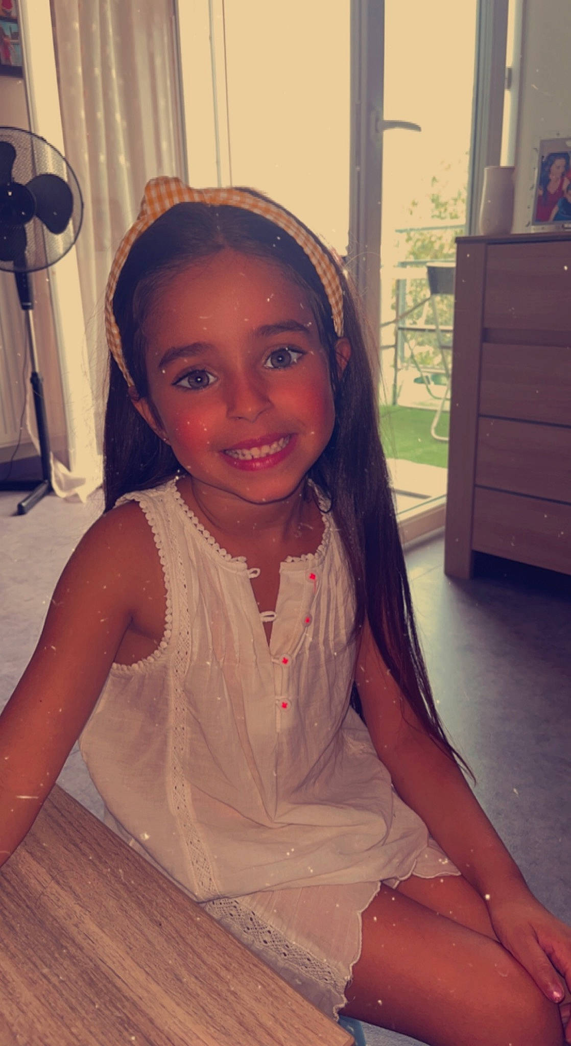 Shanna participe au concours pour gagner de l'argent avec cette photo : black_hair, cabinetry, chest, chin, cool, drawer, dress, eye, eyebrow, flash_photography, flooring, happy, iris, joy, long_hair, neck, person, skin, smile, thigh