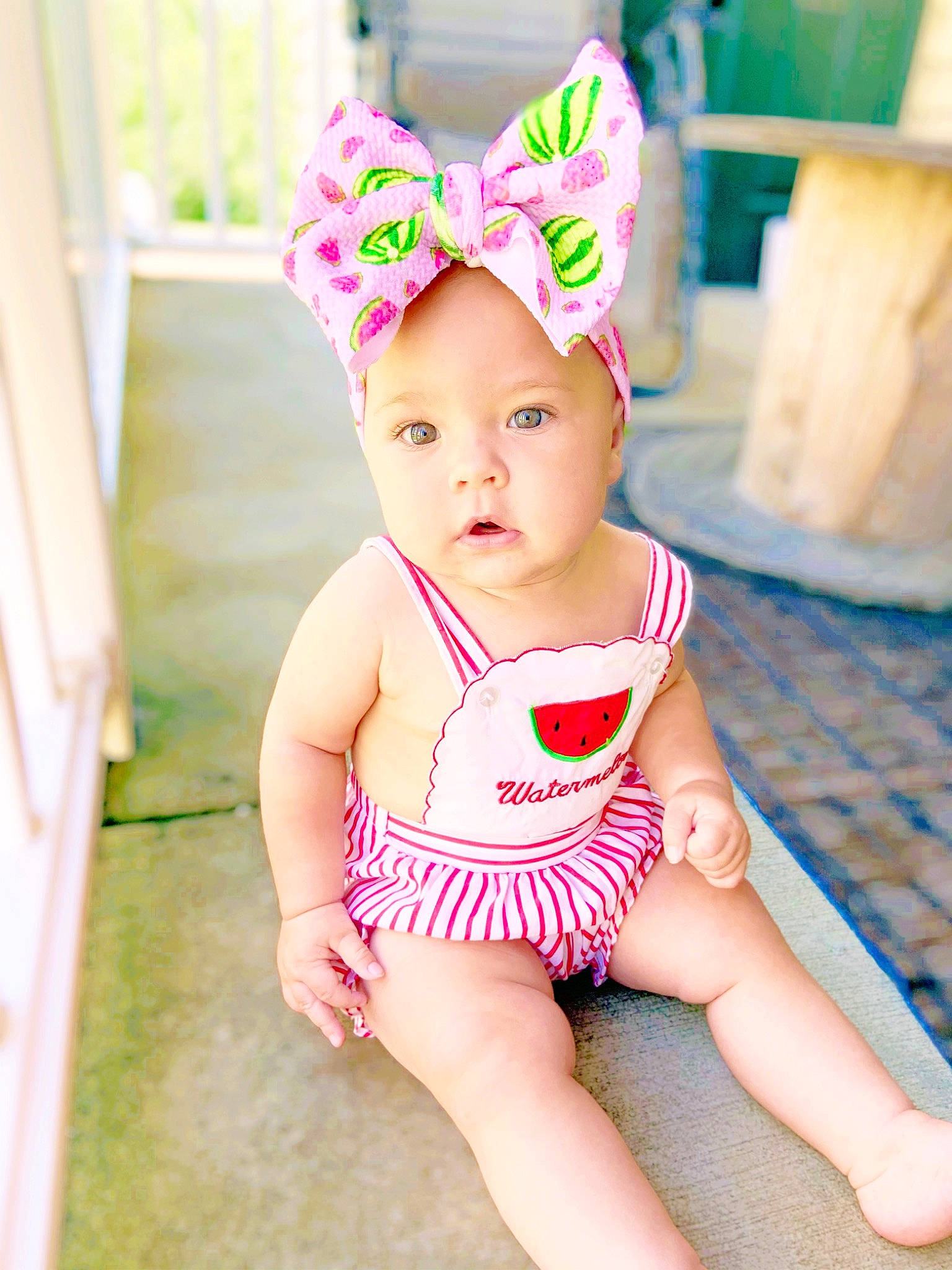 Remi joined the competition — help win amazing prizes! baby, baby_products, baby_toddler_clothing, child, child_model, clothing, headgear, headwear, one_piece_swimsuit, person, pink, product, swimwear, toddler