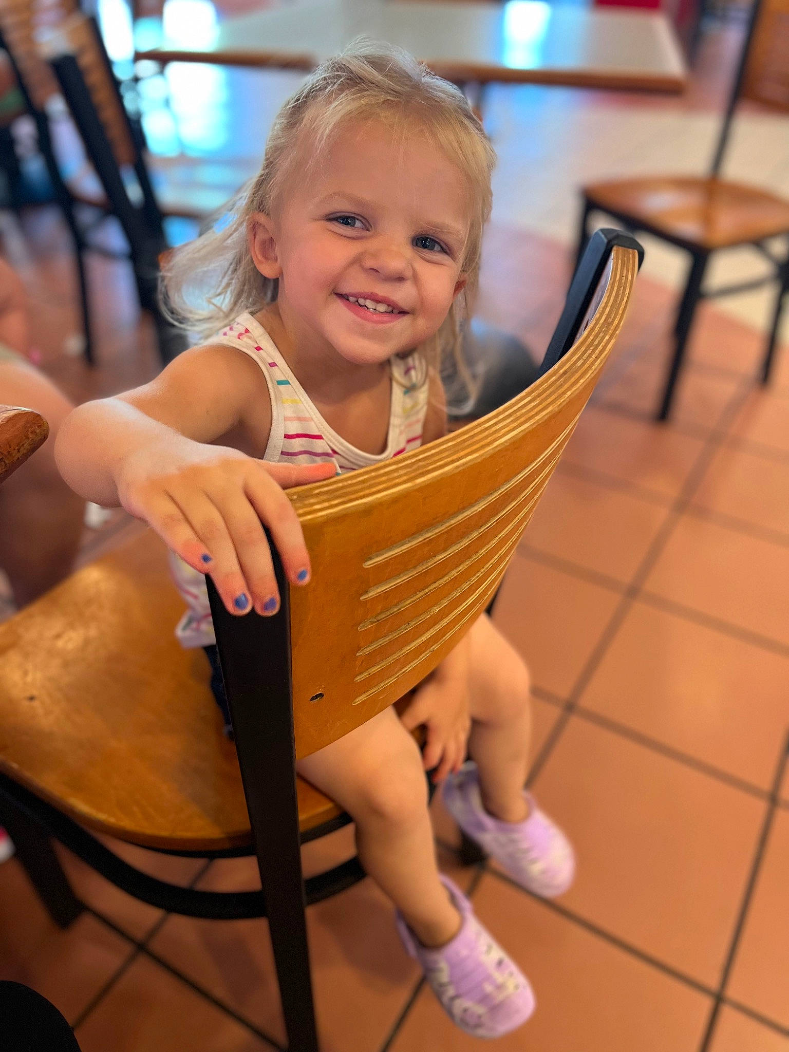 Mia Rose is registered to the contest to win money with this photo: chair, child, eye, face, floor, flooring, fun, hairstyle, happy, human_leg, joy, leg, leisure, person, shoe, skin, smile, snapshot, summer, thigh