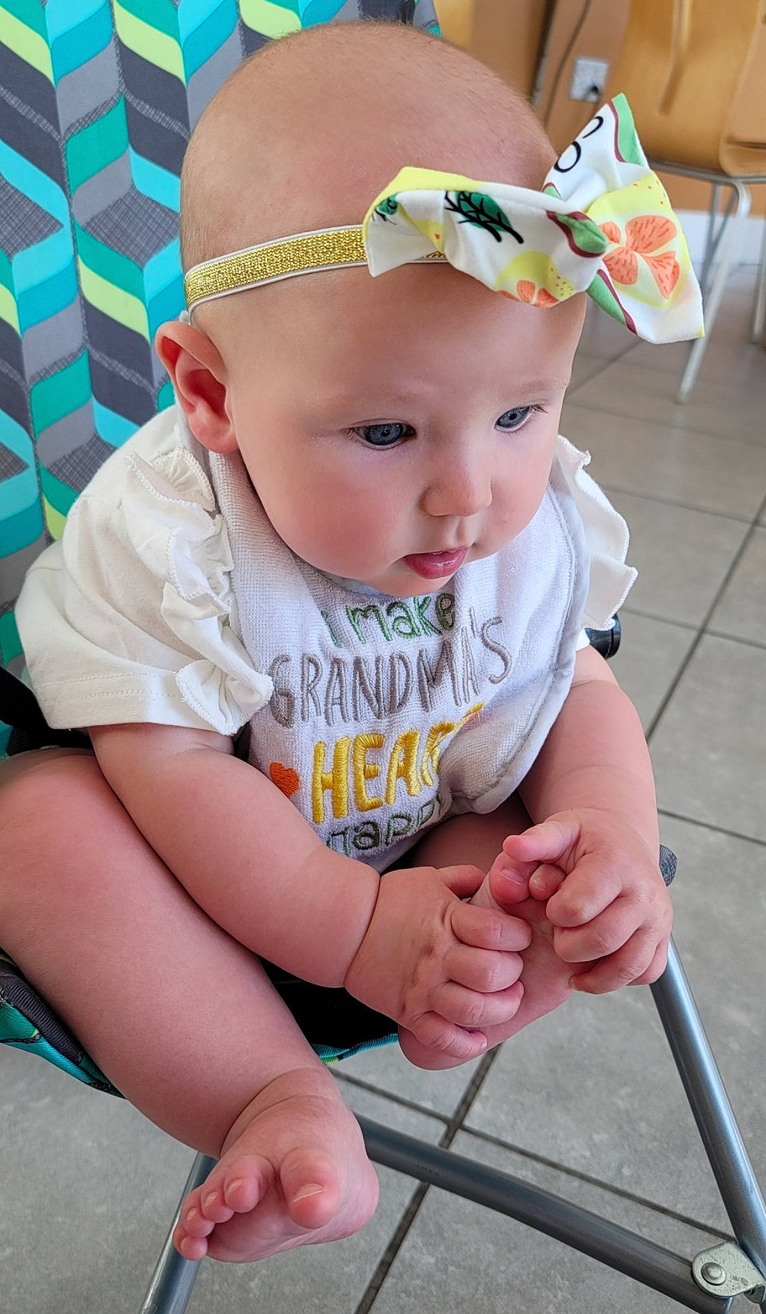 Delaney is registered to the contest to win money with this photo: baby, baby_toddler_clothing, cap, cheek, child, chin, eye, glasses, grass, green, hairstyle, happy, hat, head, headwear, organ, person, photograph, pink, skin