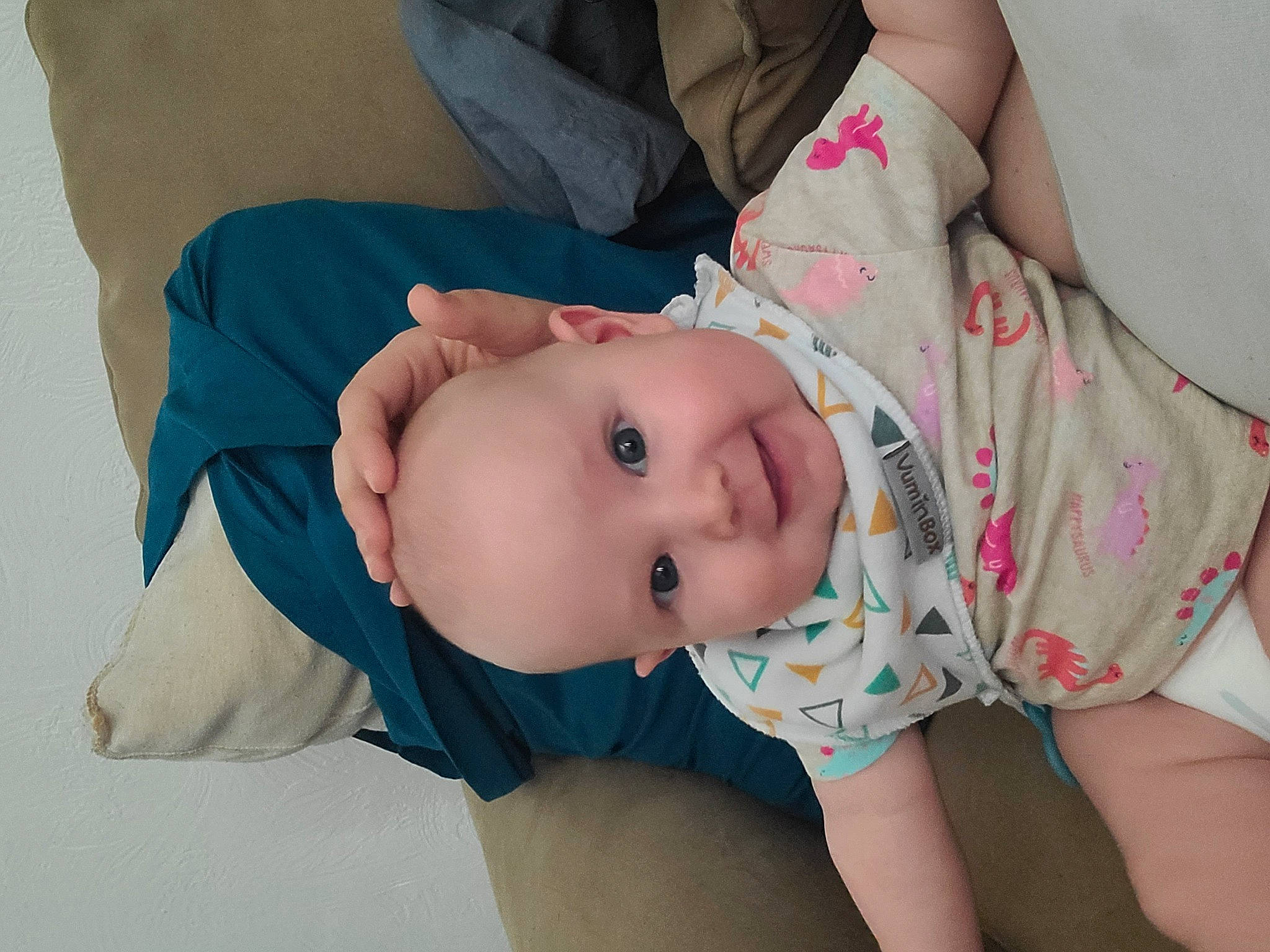 Delaney joined the competition — help win amazing prizes! arm, baby, baby_toddler_clothing, cheek, comfort, eye, eyelash, finger, hand, head, human_body, iris, joint, joy, lip, mouth, neck, person, shoulder, skin