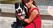 Paddle participe au concours pour gagner de l'argent avec cette photo : girl, dog, red_dress, steps, water_fountain, globe, outdoor, sunny, pet, child, leash, smiling, happy, candid, urban, casual, summer, playful, nature, park