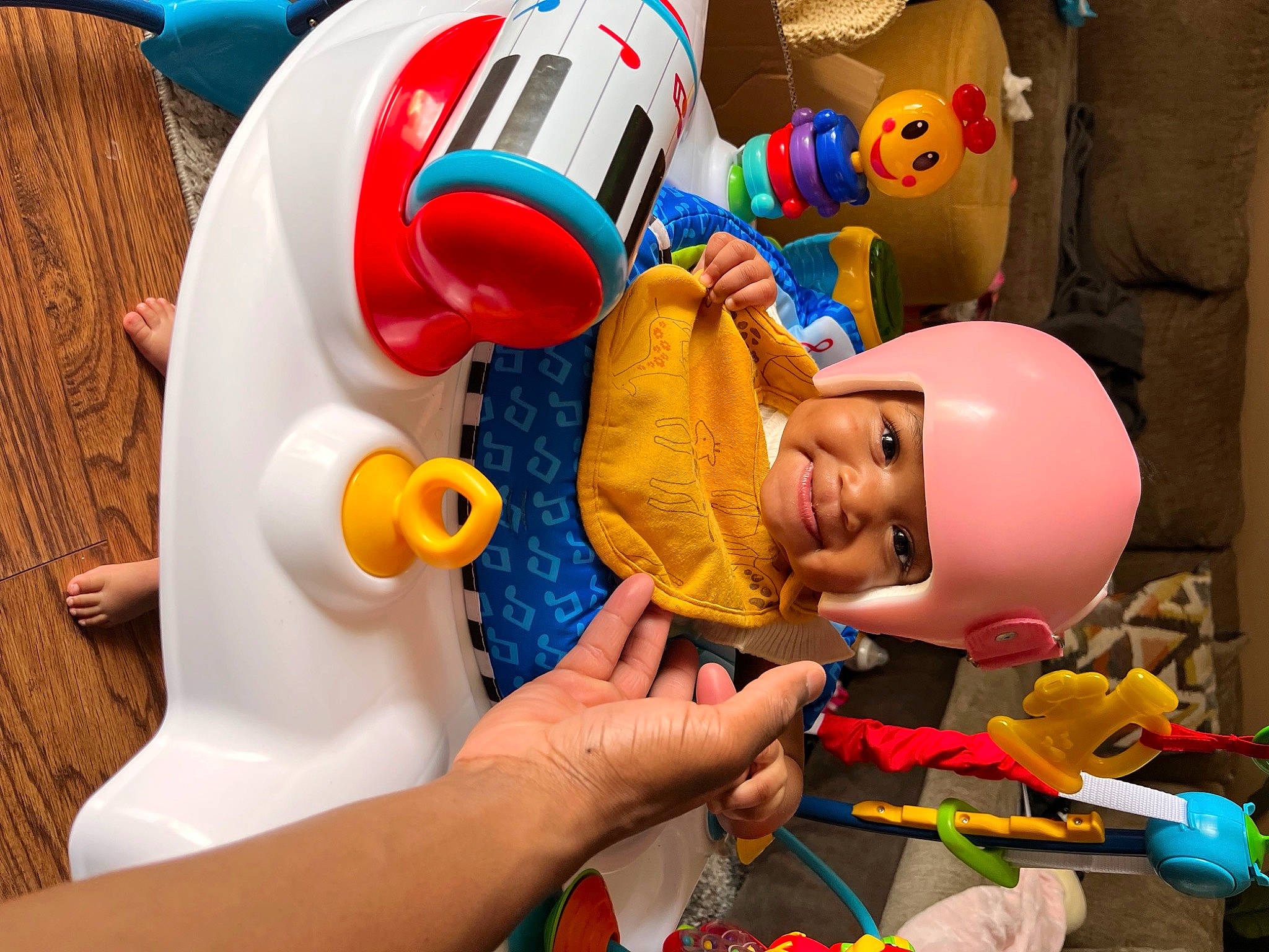 Emori is registered to the contest to win money with this photo: animated_cartoon, animation, baby_products, baby_toys, blue, child, event, fun, games, happy, hat, headwear, joy, leisure, party_supply, person, plastic, play, recreation, red