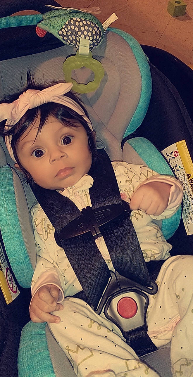 Alanah is registered to the contest to win money with this photo: baby, baby_carriage, baby_in_car_seat, baby_toddler_clothing, beauty, car_seat, cheek, child, comfort, cool, eyelash, happy, headwear, human_body, mouth, organ, person, product, skin, surprise