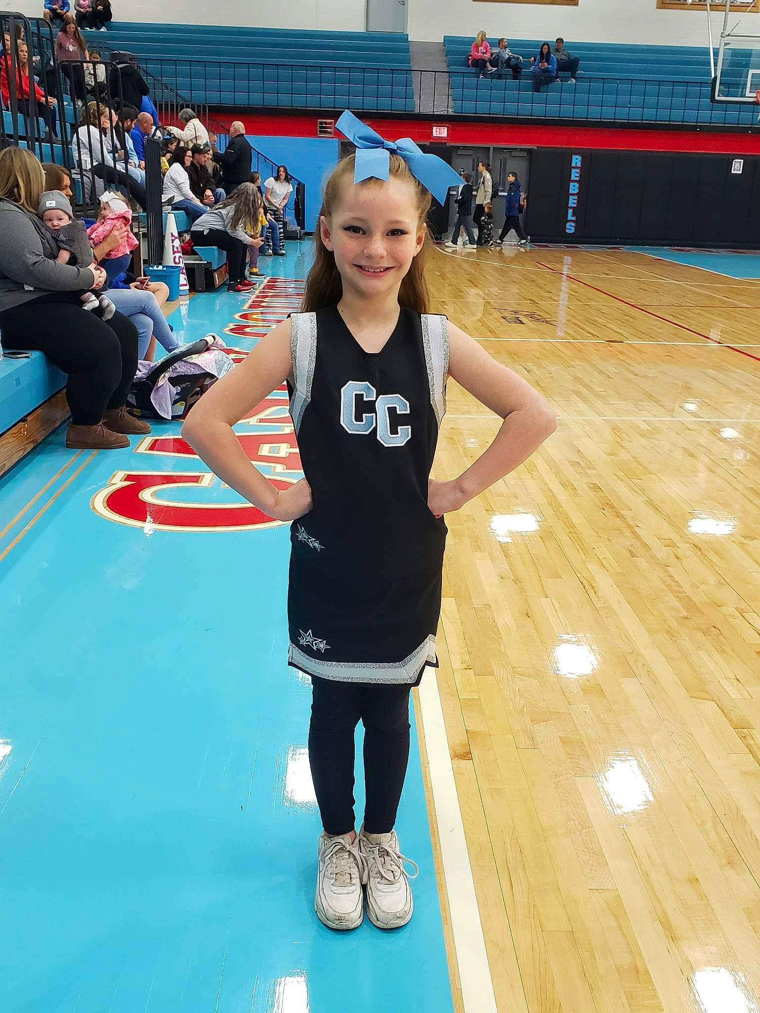 Emily Myjesta joined the competition — help win amazing prizes! blue, competition_event, electric_blue, event, field_house, flooring, fun, headwear, human_body, joy, knee, leisure, person, player, shorts, sleeveless_shirt, smile, sports, sports_uniform, sportswear