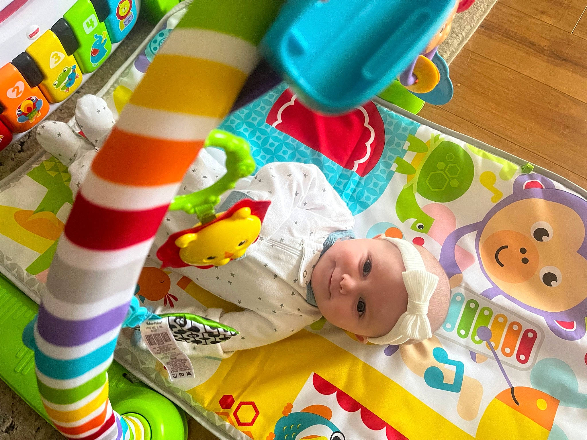 Lyla joined the competition — help win amazing prizes! baby, baby_playing_with_toys, baby_products, baby_toddler_clothing, baby_toys, child, event, fun, headwear, inflatable, leisure, party_supply, person, plastic, play, playmat, product, recreation, room, toddler