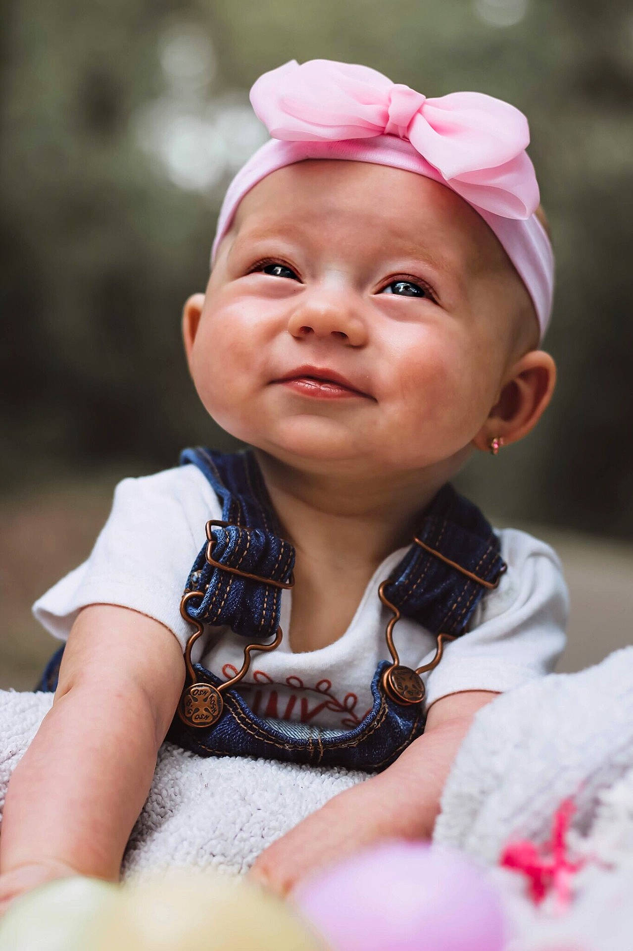Paislee Kay is registered to the contest to win money with this photo: beauty, cheek, child, facial_expression, flower, fun, girl, hair_accessory, happiness, headband, headgear, headpiece, human, infant, laughter, person, pink, portrait_photography, skin, smile