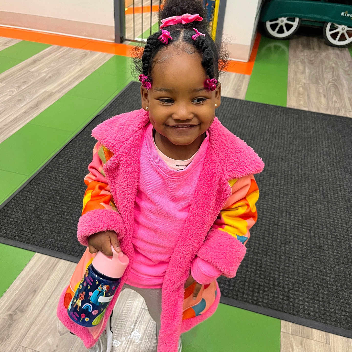 Weslynn joined the competition — help win amazing prizes! blackhair, child, clothing, face, female, footwear, girl, hair, happy, head, indoors, interiordesign, machine, person, photography, portrait, sitting, sleeve, smile, wheel